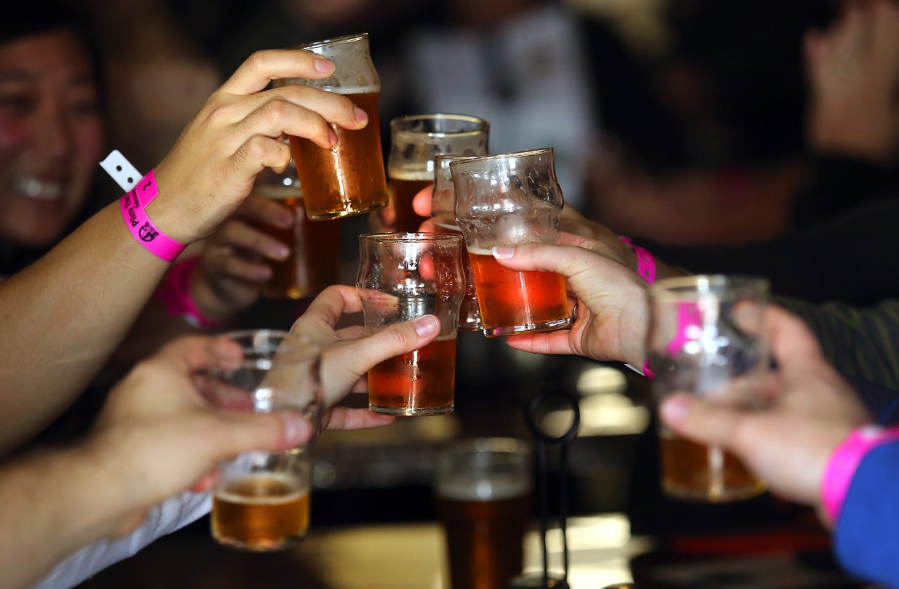 Beer lovers from around the world stood in line for their chance to taste Pliny the Younger at Russian River Brewing Company in Santa Rosa on Friday. (JOHN BURGESS / The Press Democrat)