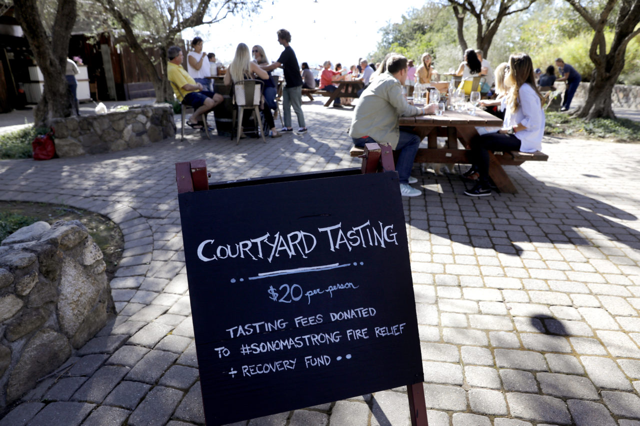 A sign announces a fire relief fundraiser at Gundlach Bundschu in Sonoma, on Sunday, October 22, 2017. (Photo by Beth Schlanker)