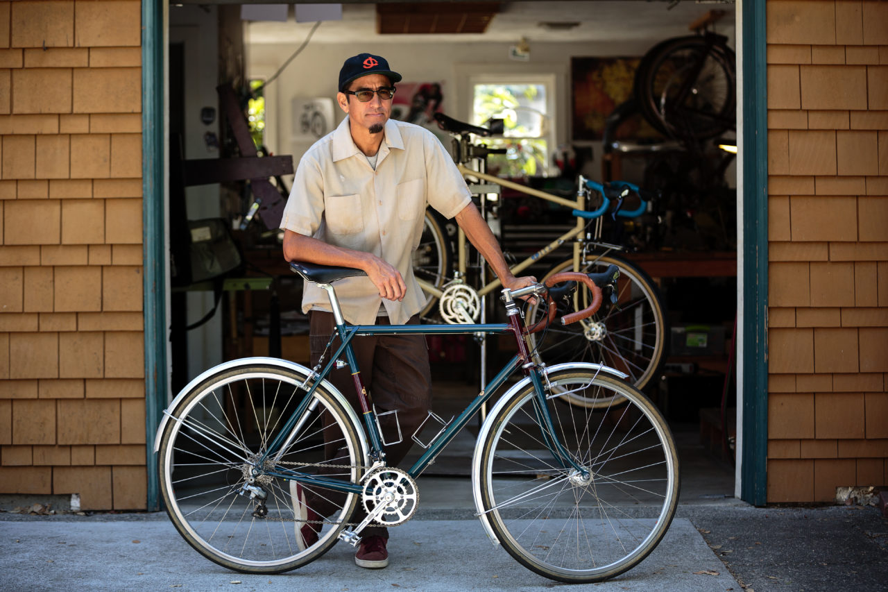 Tom Fitzgerald making a bike frame in his garage/workshop