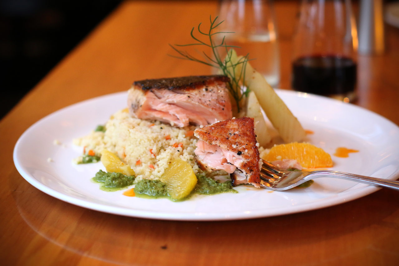 Salmon and couscous with orange at Salt and Stone Restaurant in Sonoma County, Kenwood. Heather Irwin/PD