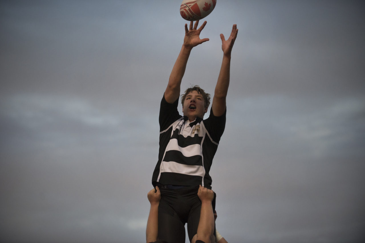 Petaluma High Junior Luke Haggard, 17, warming up before a Lobo Rugby Club game against Santa Rosa High held at Elsie Allen High School Friday evening. March 25, 2017. (Photo: Erik Castro/for The Press Democrat)