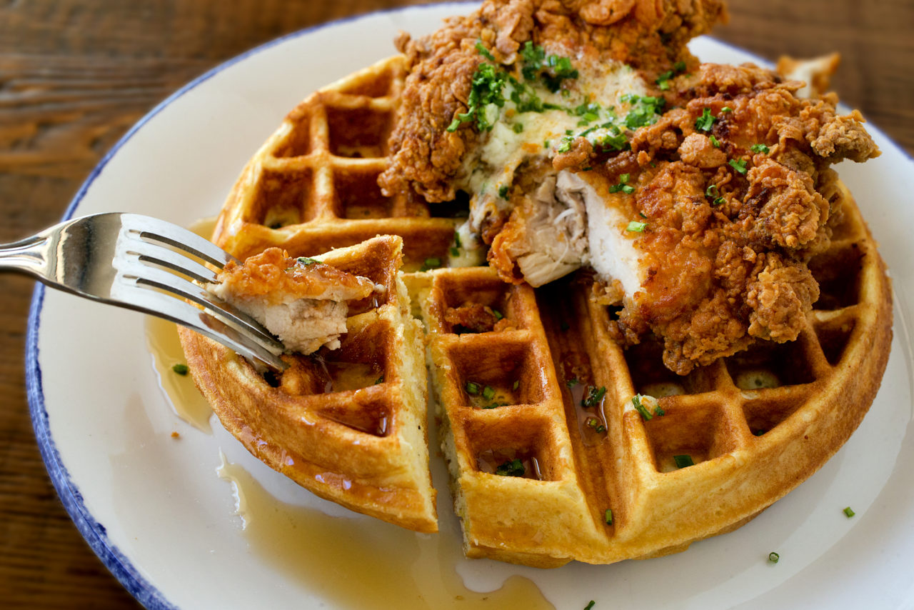 Chick N' Waffles with buttermilk fried chicken, cornmeal waffles, maple syrup and mascarpone butter from Chicken Pharm, a Public House in Petaluma. (John Burgess/The Press Democrat)