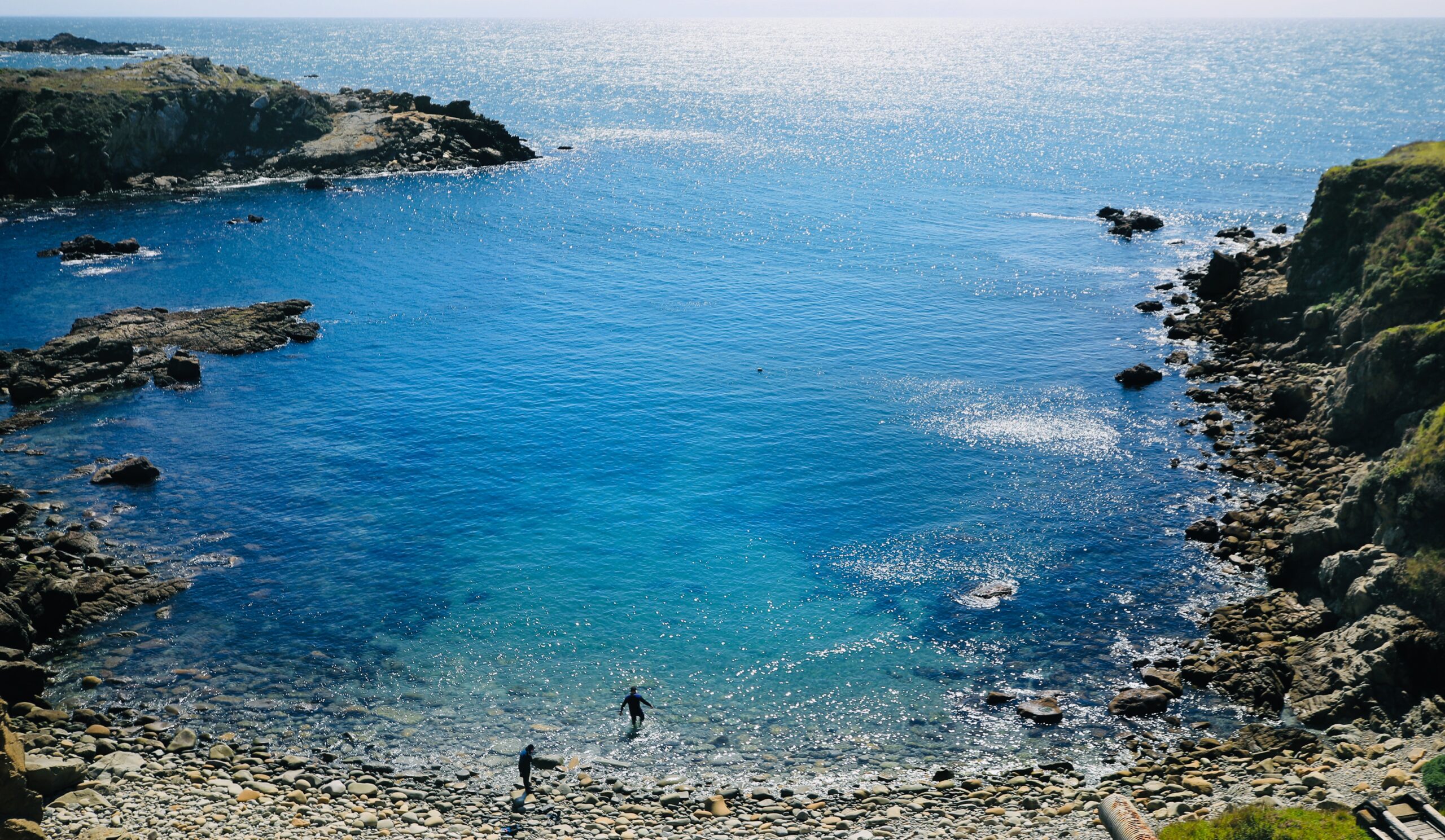 Dan Furr and his daughter Chelsea, 13, of Woodland, prepare to snorkel in Gerstle Cove on the Sonoma coast at Salt Point, Saturday, March 13, 2021. Very little bull kelp remains in the cove. (Kent Porter / The Press Democrat) 2021