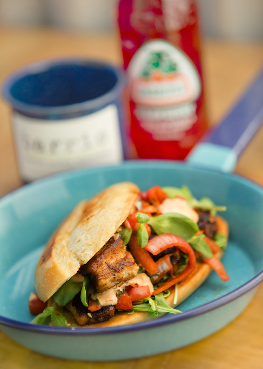 Torta el Chavo served on torpedo bread with pork belly, chipotle aioli, pico de gallo and arugula from Barrio Fresca Cocina Mexicana in Sebastopol's The Barlow. (John Burgess / The Press Democrat)