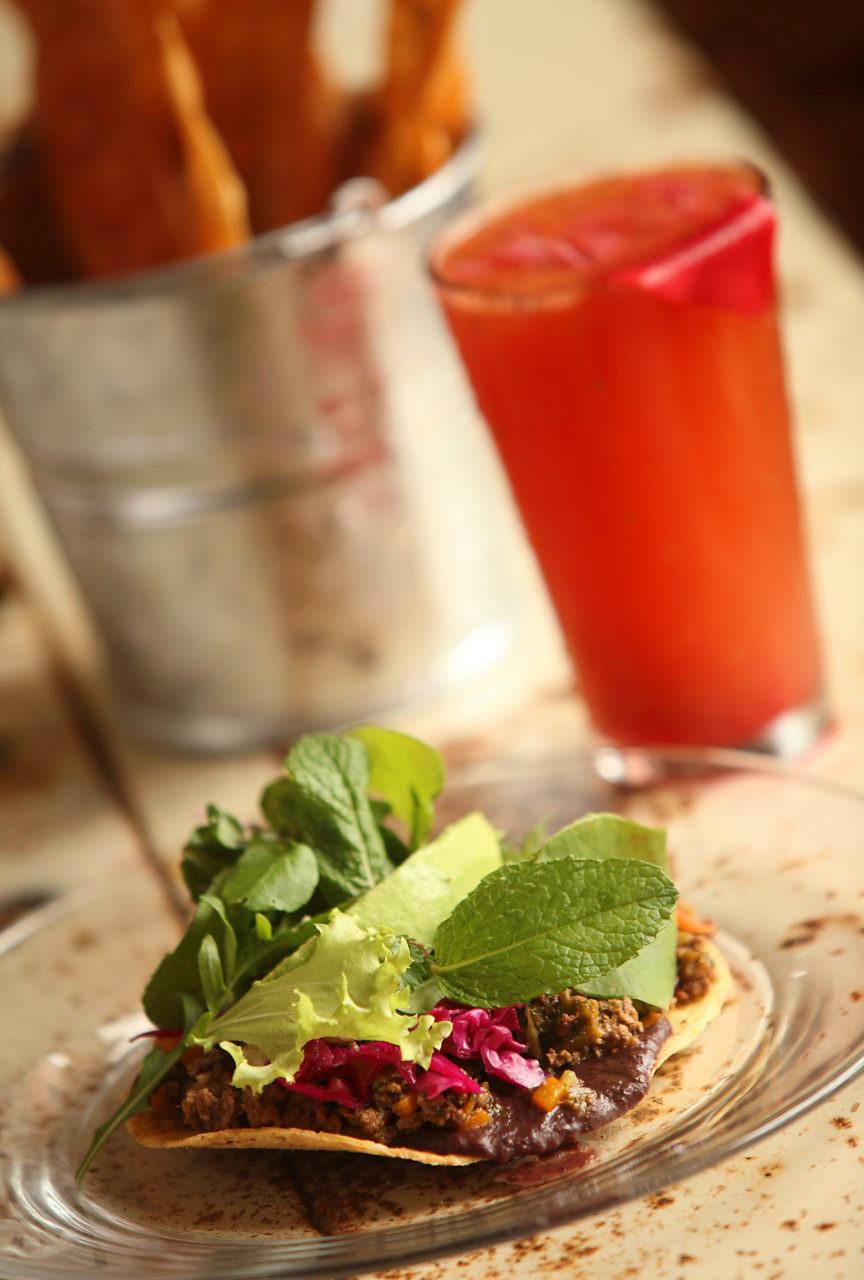 5/16/2012: D1: PC: Tostada with Ground Beef Yucatan Picadillo, by Mateo Granados, at Mateo's Cocina Latina, served with a Michelada.