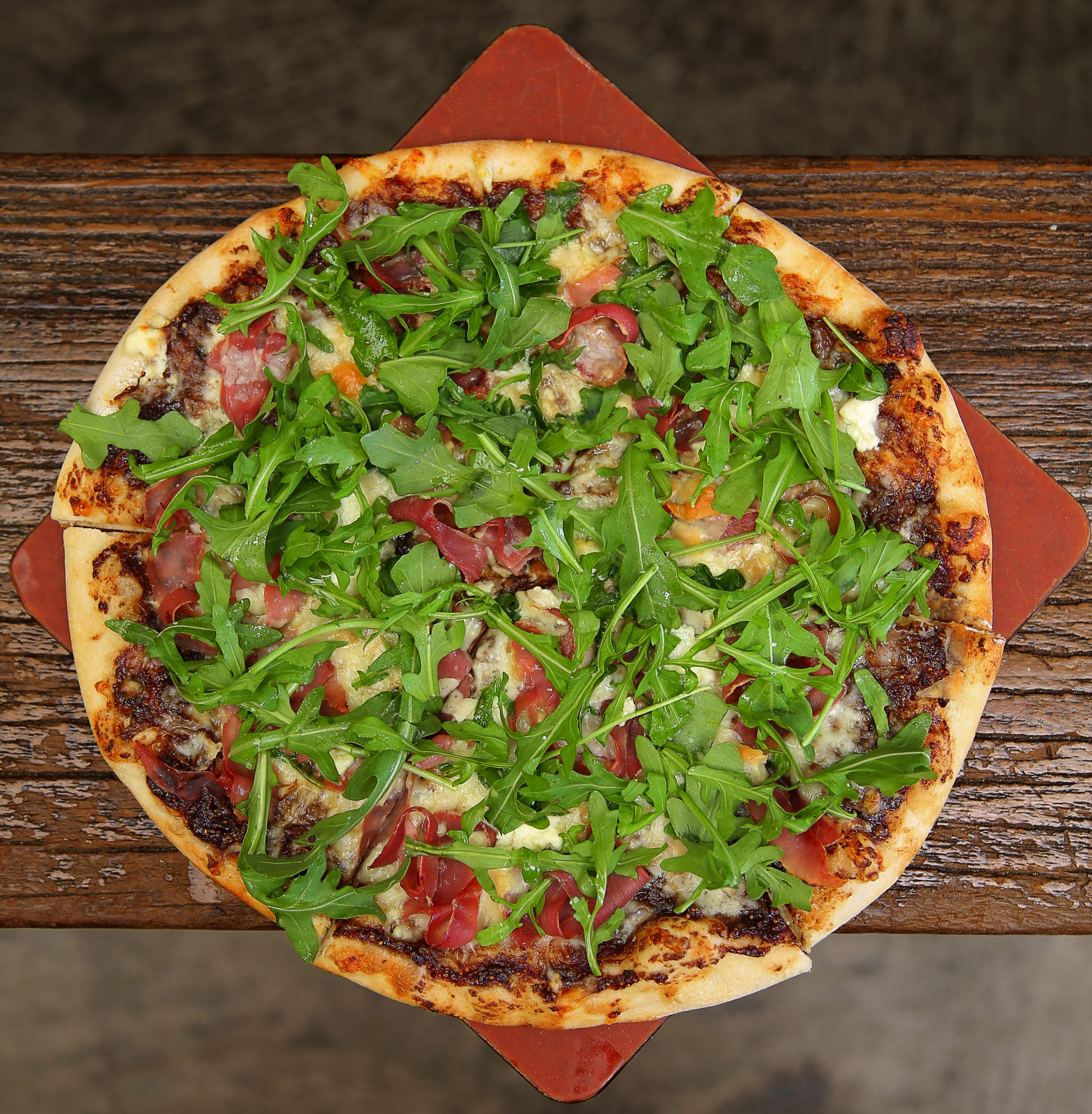 Four Cheese Fig & Pig Pizza from Wild Goat Bistro in Petaluma. (Christopher Chung / The Press Democrat)