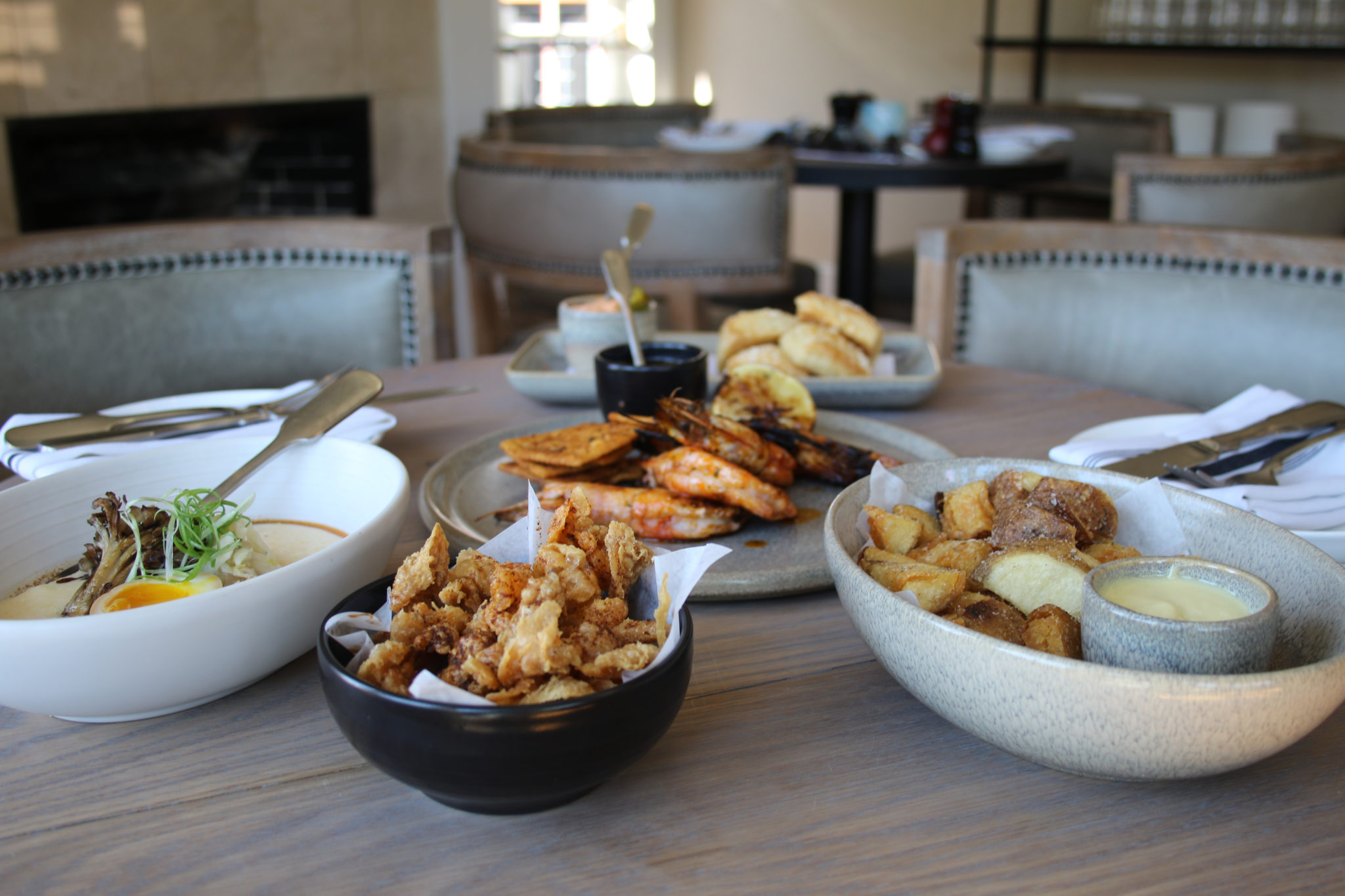 Wood grilled Gulf shrimp, grits and potatoes at Bird and the Bottle in Santa Rosa. (Heather Irwin/Sonoma Magazine)