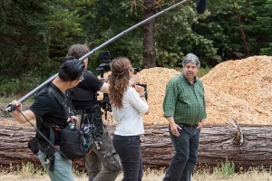 "Ice on Fire" film crew filming Raymond Baltar, RFFI Biochar Project director, at RFFI’s North Coast Biochar facility near Piercy, Calif. (Jeff Becker)