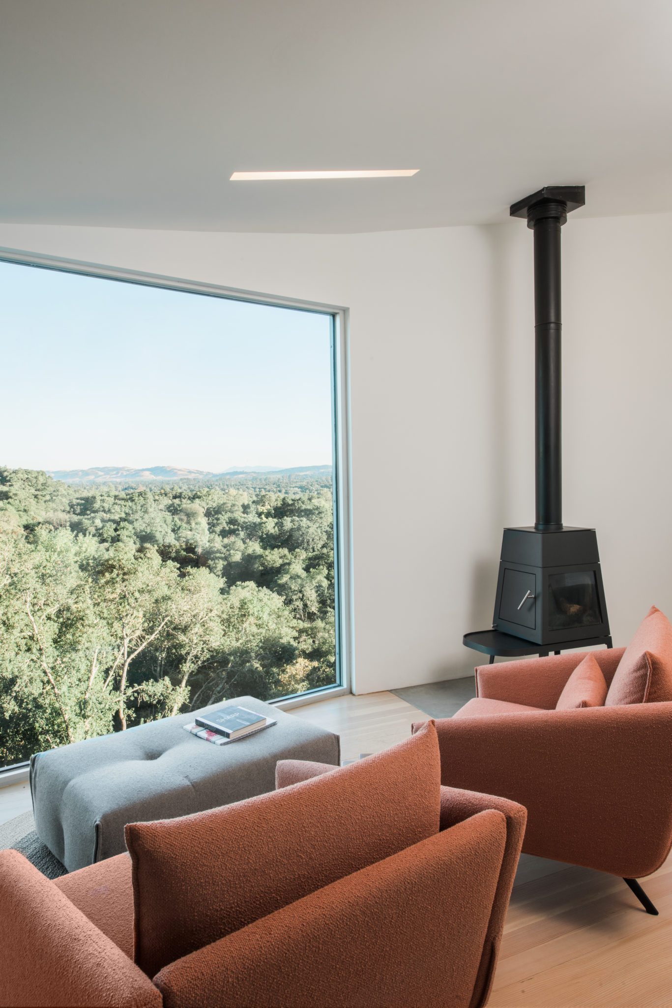 Sitting area with Wittus Shaker stove by Italian designer Antonio Citterio