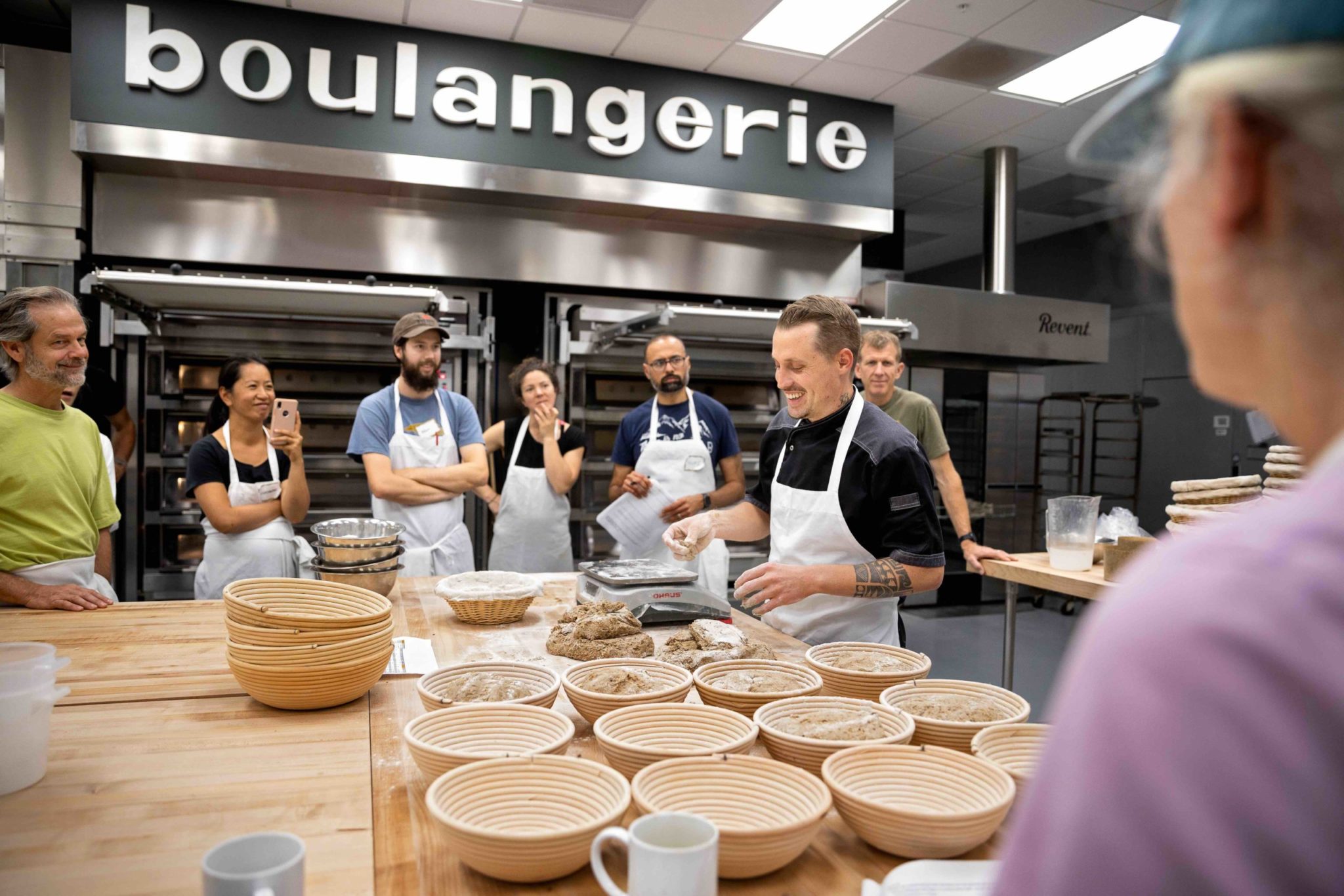 Instructor Pablo Puluke Giet teaching baking at the Artisan Baking Center Pablo preparing dough