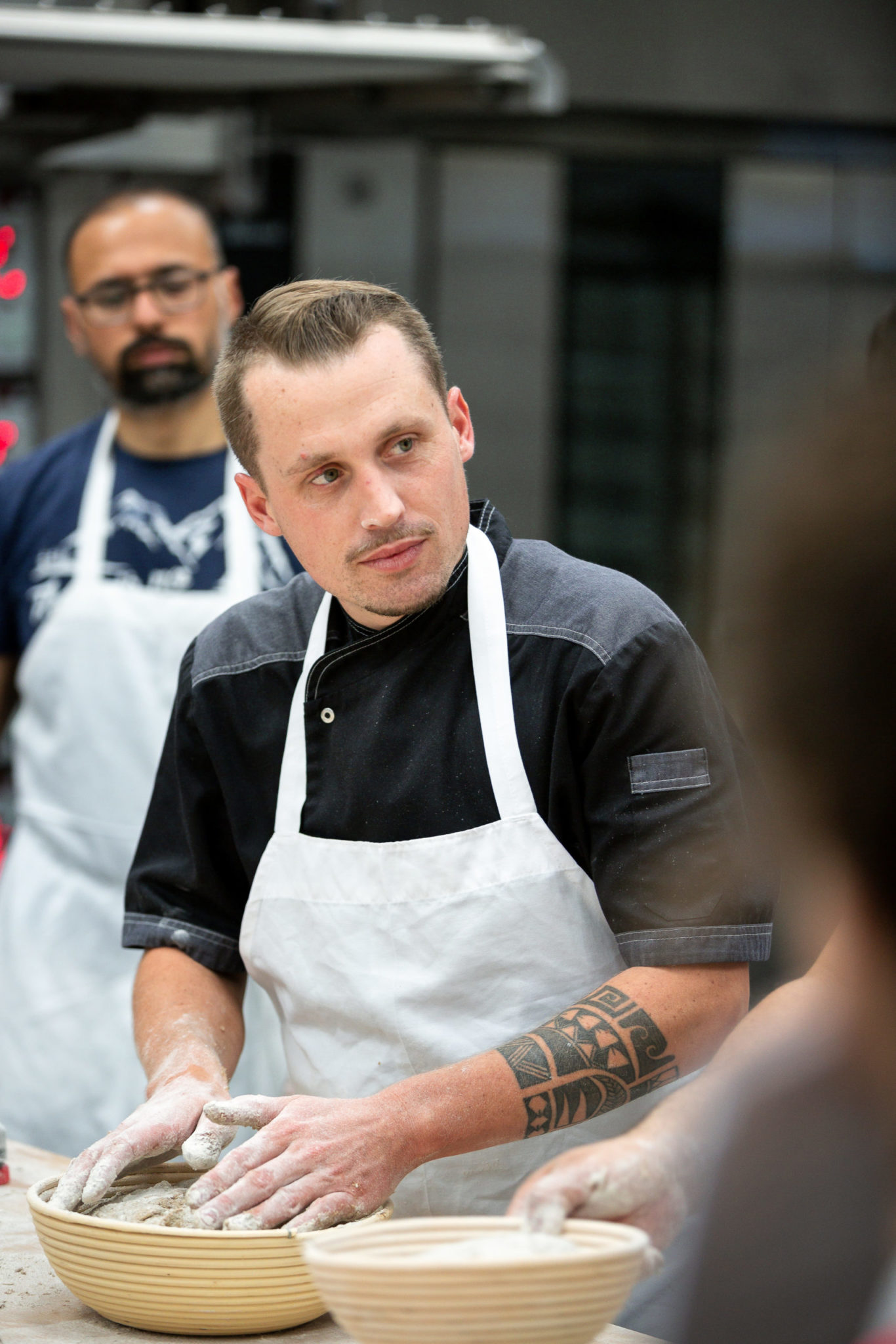 Instructor Pablo Puluke Giet teaching baking at the Artisan Baking Center