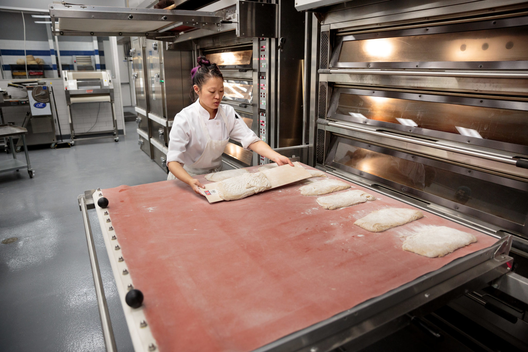 Instructor Pablo Puluke Giet teaching baking at the Artisan Baking Center