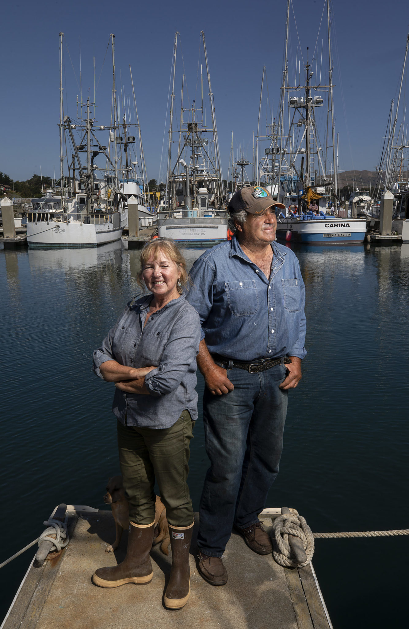 Nya and Jeff Genovese team up to fish on La Dolce Vita at the Spud Point Marina in Bodega Bay. (John Burgess)