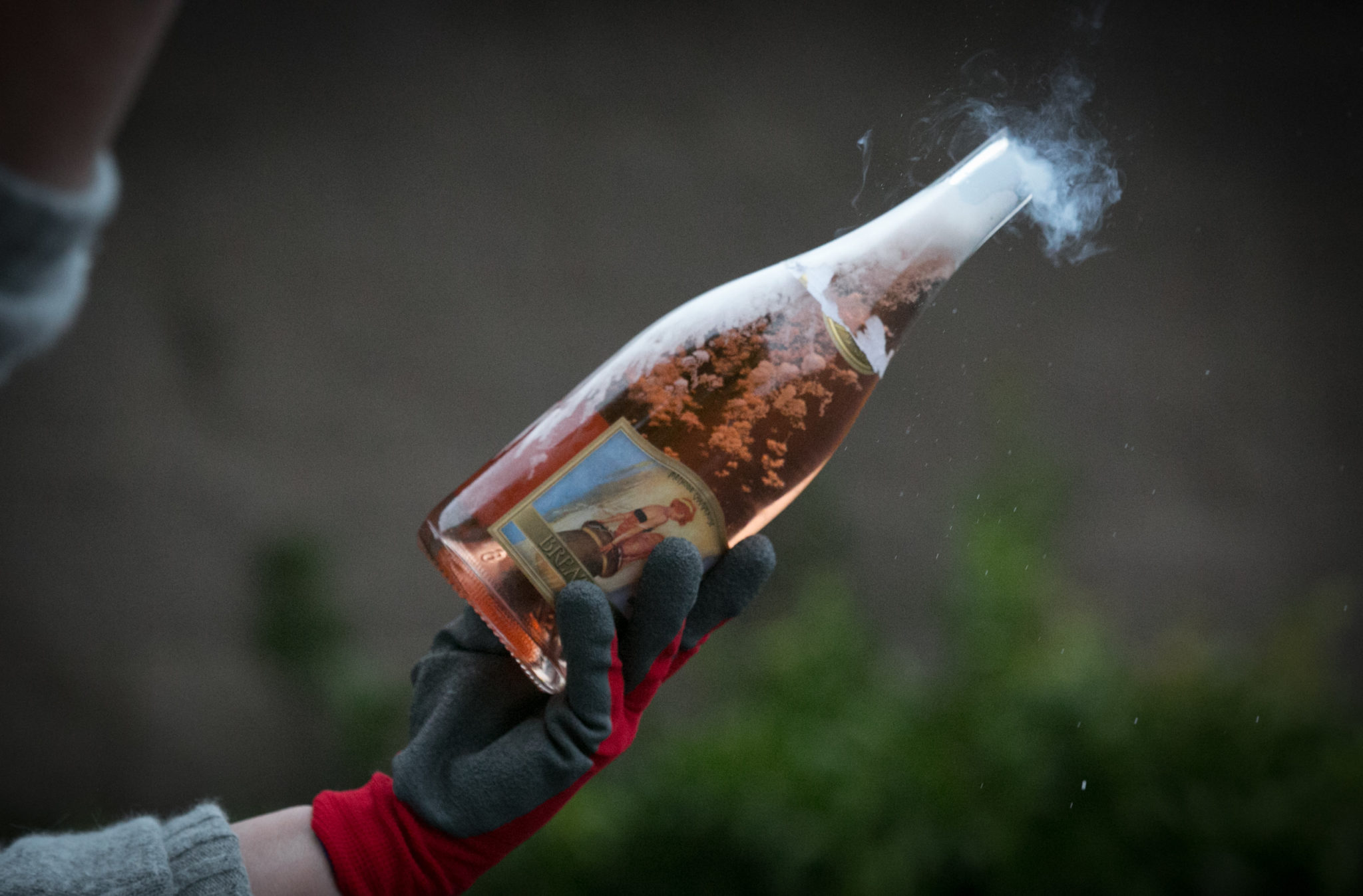 Breathless Wines held its holiday party featuring sabering, the art of lopping off the top of a bottle of bubbly with a sword, in addition to wine and food pairings.