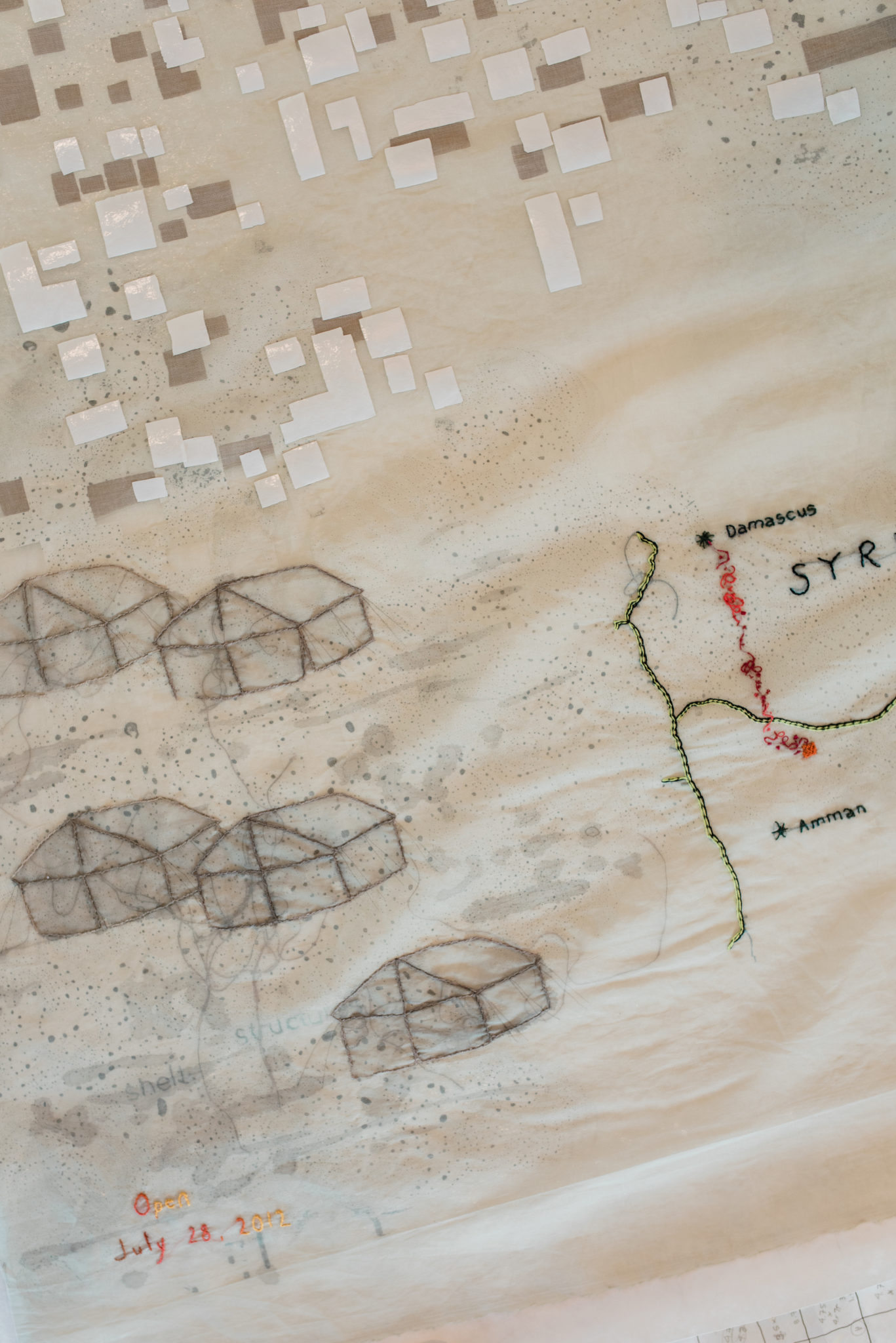 Close up of the Refugee piece which depicts the layout of Syrian refugee camps.