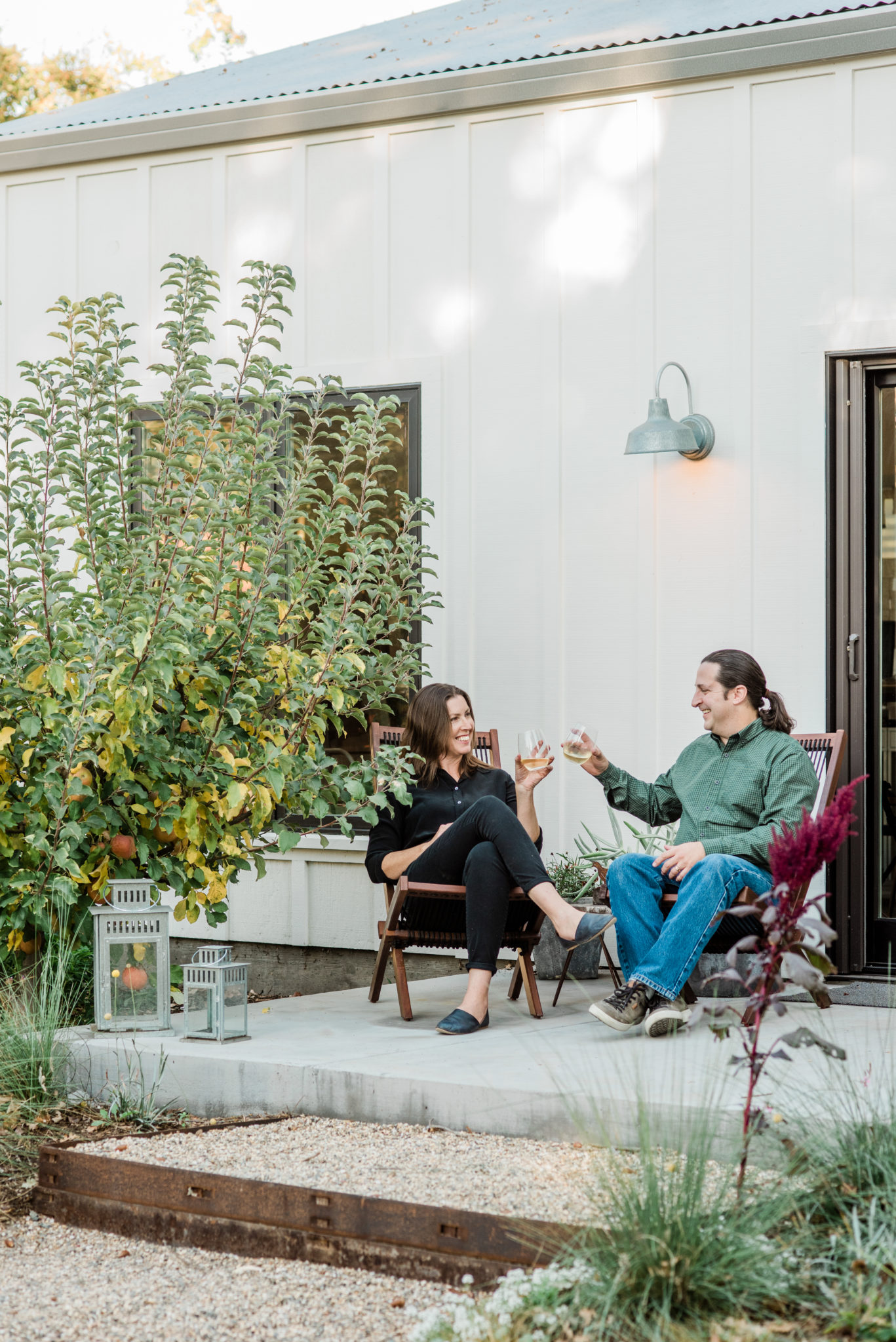 Kathryn with her husband outside studio.