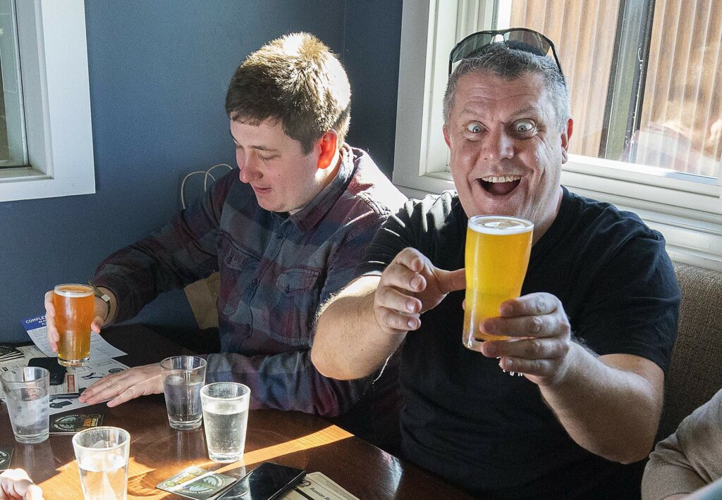 A group of friends traveled from Germany for the first day release of Pliny the Younger triple IPA at the Russian River Brewery in Windsor. (photo by John Burgess/The Press Democrat)