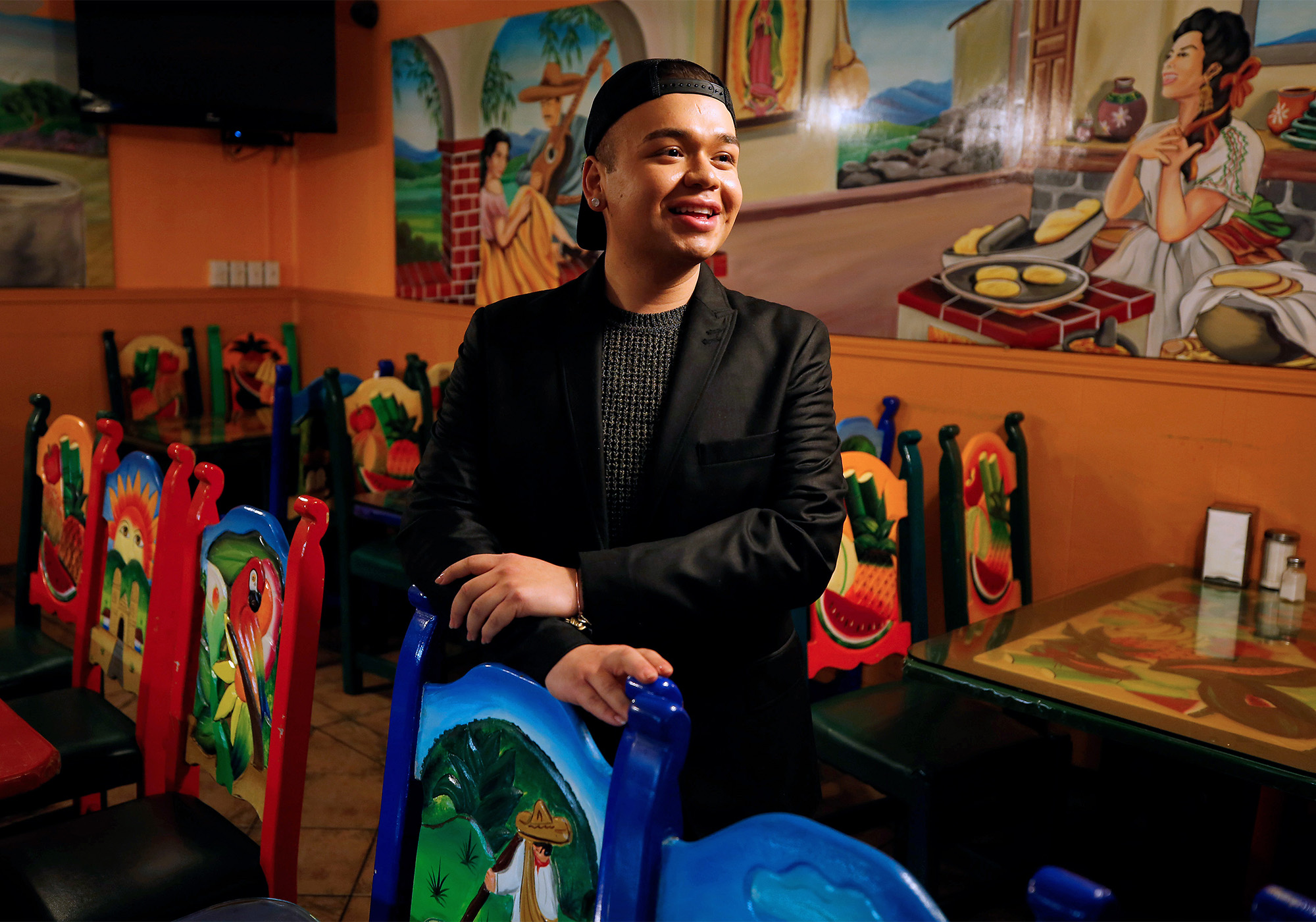 Ivan Reyes, general manager of La Fondita restaurant which is owned by his mother Elena Reyes, poses for a portrait in the dining room of La Fondita restaurant in the Roseland neighborhood of Santa Rosa, California, on Friday, February 15, 2019. (Alvin Jornada / The Press Democrat)