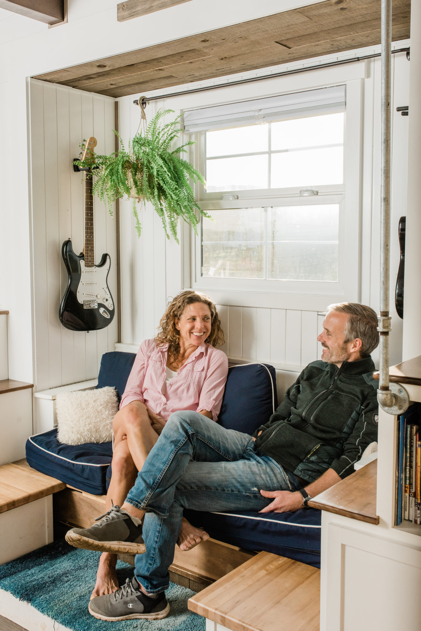 Jennifer and Justin Potts in their living room.