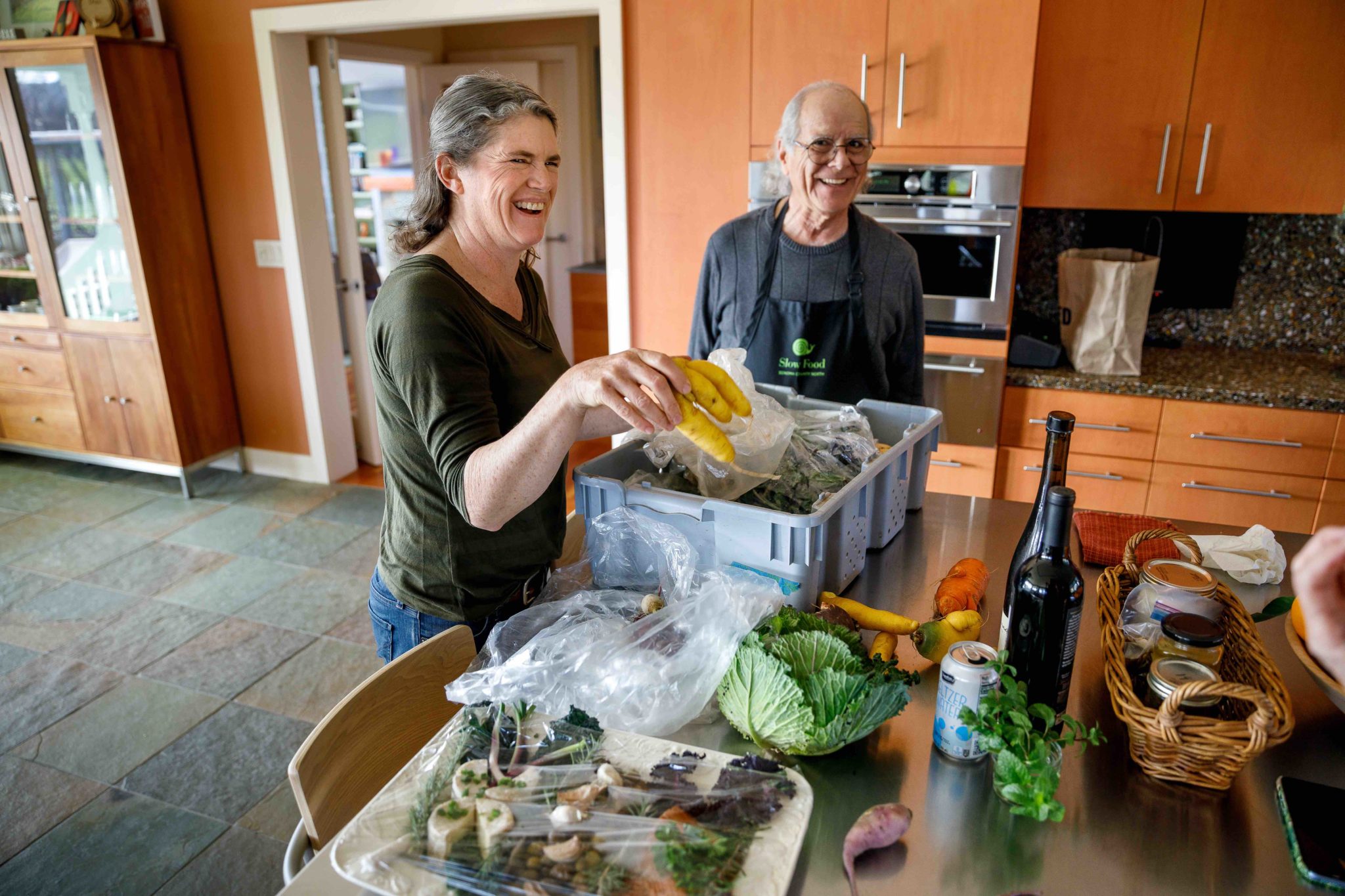 Slow Food story Carol Diaz and the Slow Food group have a dinner at her house Rebecca Bozzelli arrives with vegetables she grew with Manuel Diaz