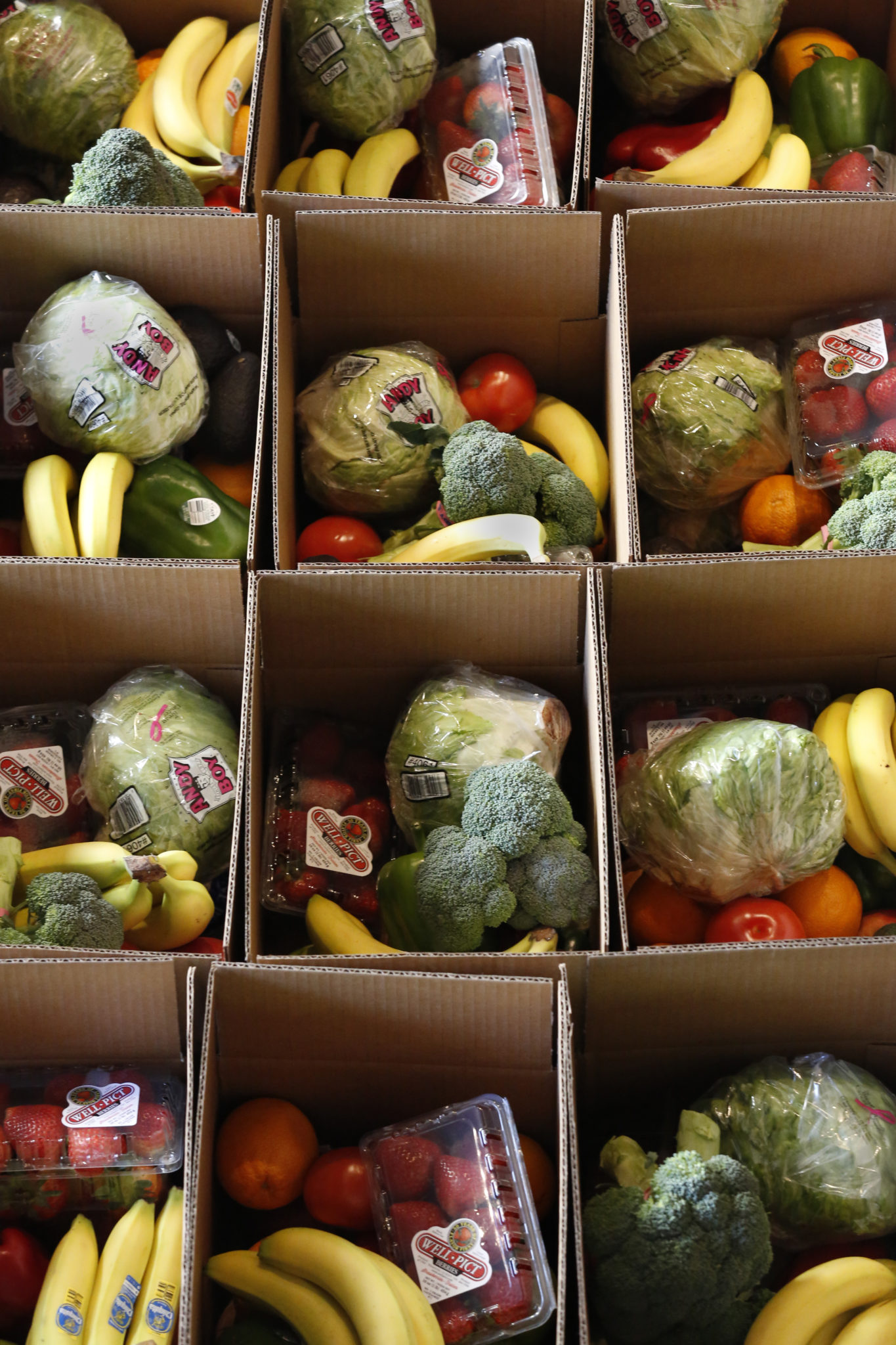 Boxes of produce for grocery boxes available for curbside pick-up at Third Street Aleworks in Santa Rosa, California on Friday, May 1, 2020. (BETH SCHLANKER/ The Press Democrat)
