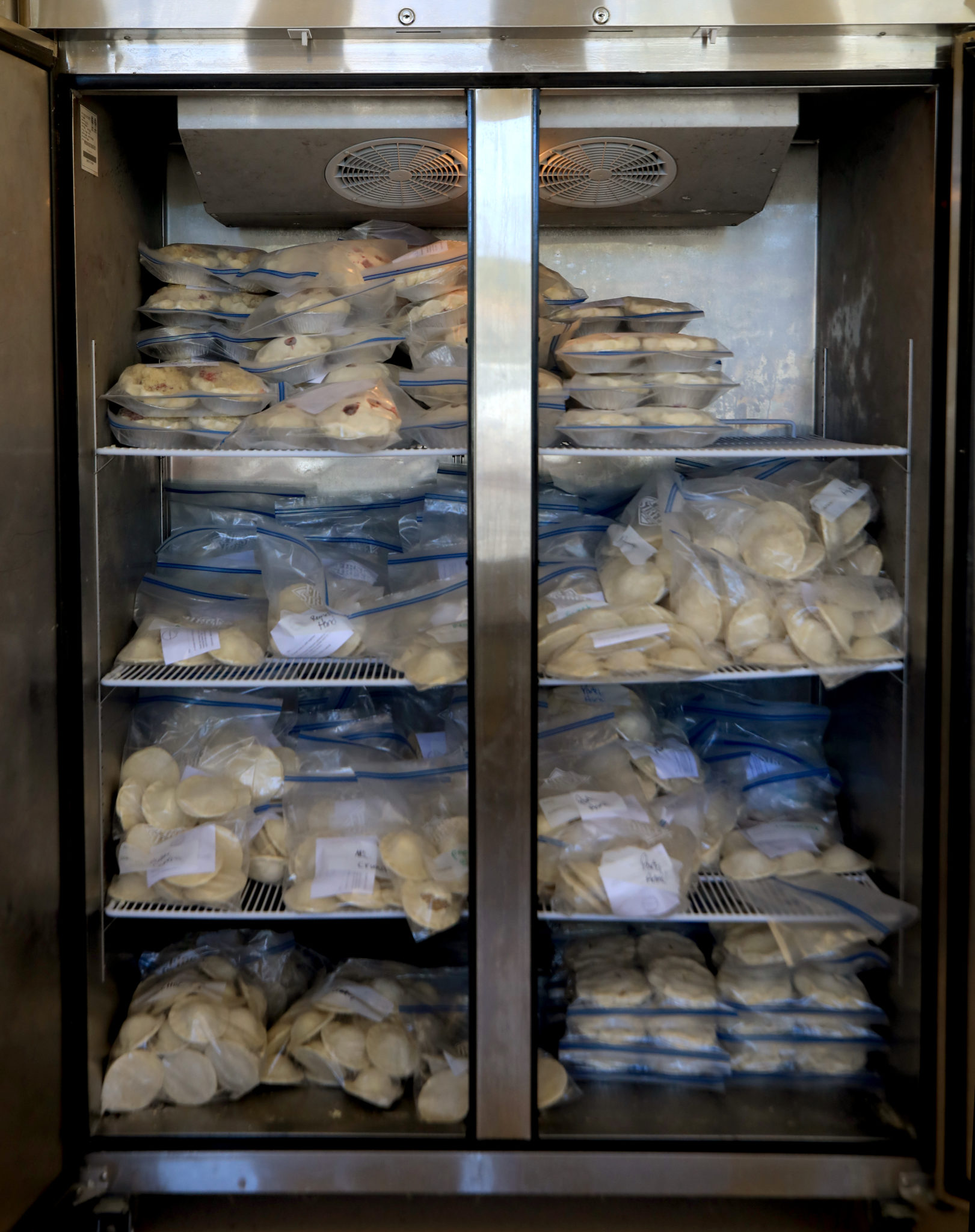 Whole Pie owner Trisha Davis has a freezer full of pies she needs to sell as she begins the process of closing her business for good due to, in no small part, the coronavirus, Wednesday, May 6, 2020 in Santa Rosa. (Kent Porter / The Press Democrat) 2020