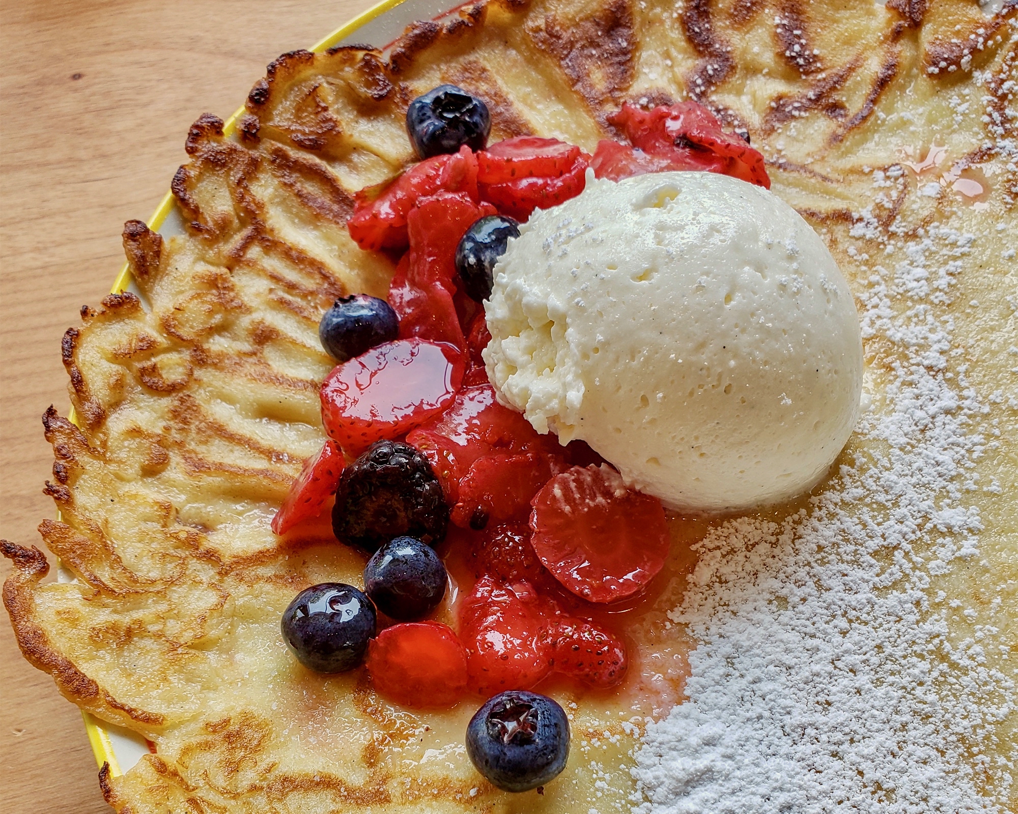 Swedish pancake with berries and whipped cream at Stockhome Restaurant in Petaluma. (Heather Irwin / Sonoma Magazine)
