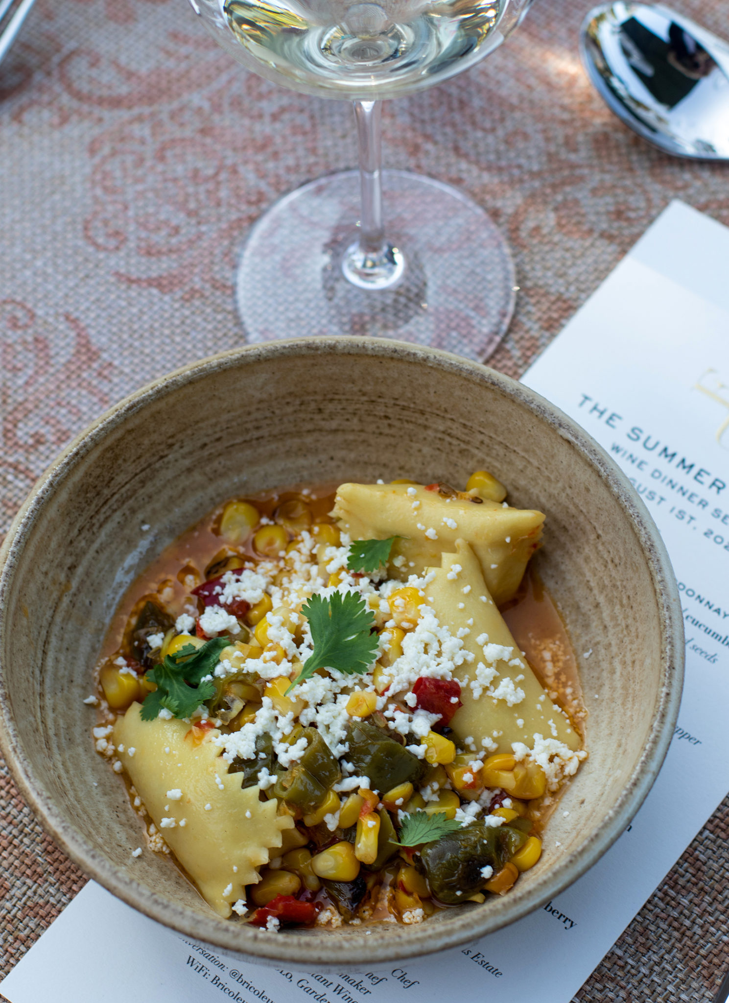 Elote agnilotti with roasted corn, charred shishito pepper, lime, cotija, cilantro at Bricoleur Vineyards’ Summer Classic Wine Dinner Series. Heather Irwin/PD