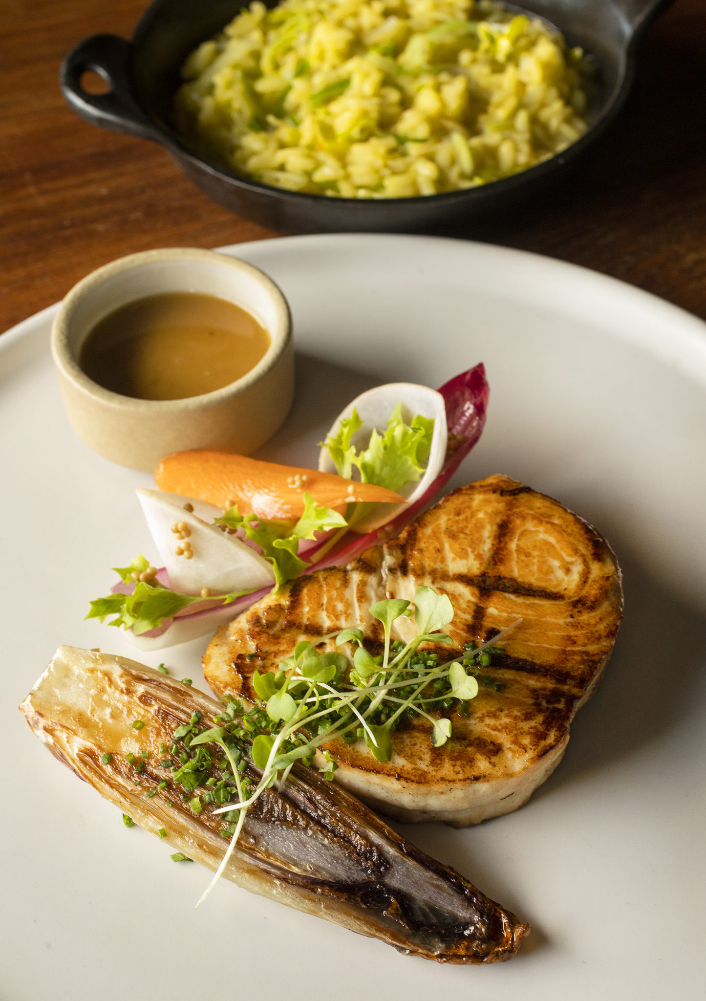 Fish"On the Yakitori" with grilled swordfish, leeks and saffron risotto from Table Culture Provisions in Petaluma. (John Burgess/The Press Democrat)