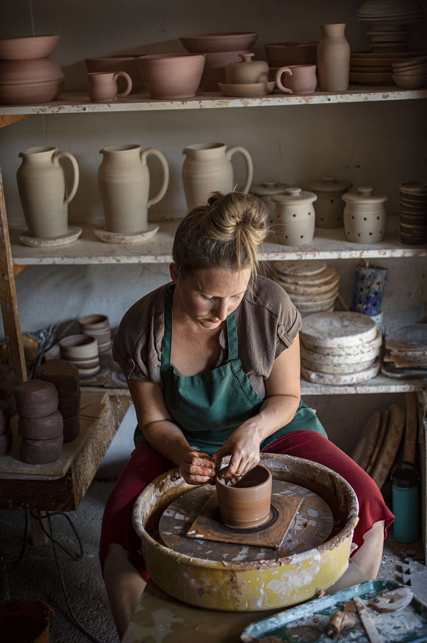 Stephanie Gwilliam throws mugs on a wheel in her Hayes Ceramics studio in Windsor on Tuesday, September 15, 2020. (Photo by John Burgess/The Press Democrat)