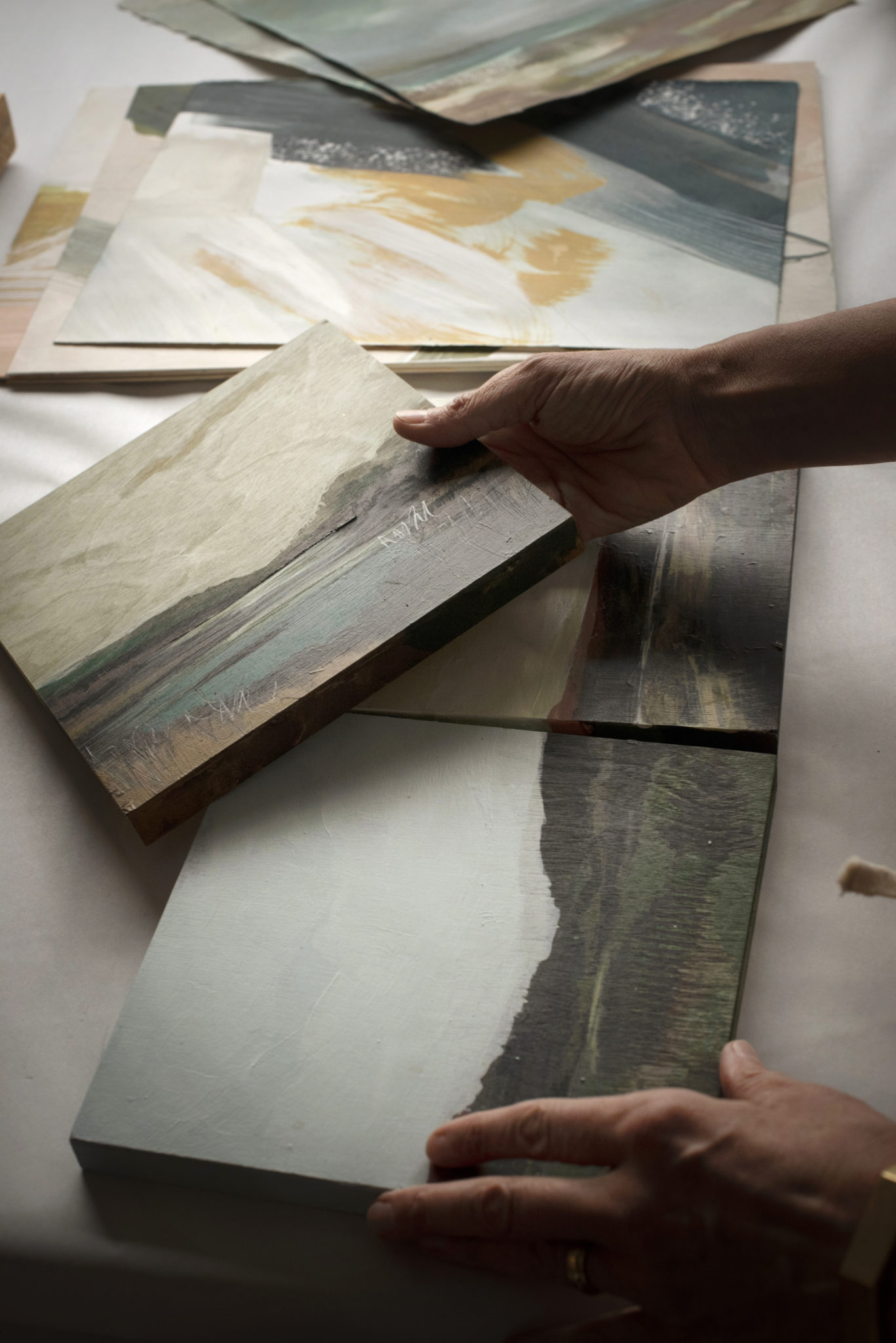 Landscape painter Alex Cole with some works in progress at her home studio in Sonoma, California. January 12, 2021. (Photo: Erik Castro/for Sonoma Magazine)