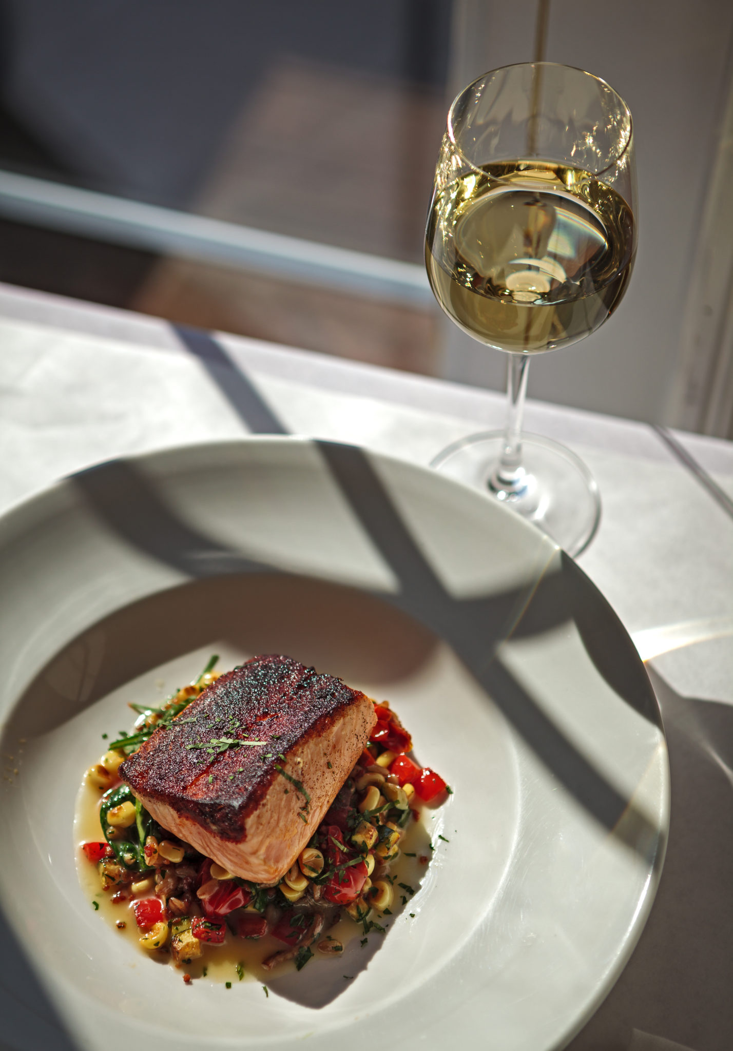 Terrapin Creek restaurant in Bodega Bay serves fresh wild salmon. Chef Andrew Truong making blackened salmon served atop a medley of roasted summer vegetables and farro. Terrapin Creek Cafe Restaurants, 150 Eastshore Road, Bodega Bay, (707)875-2700, te