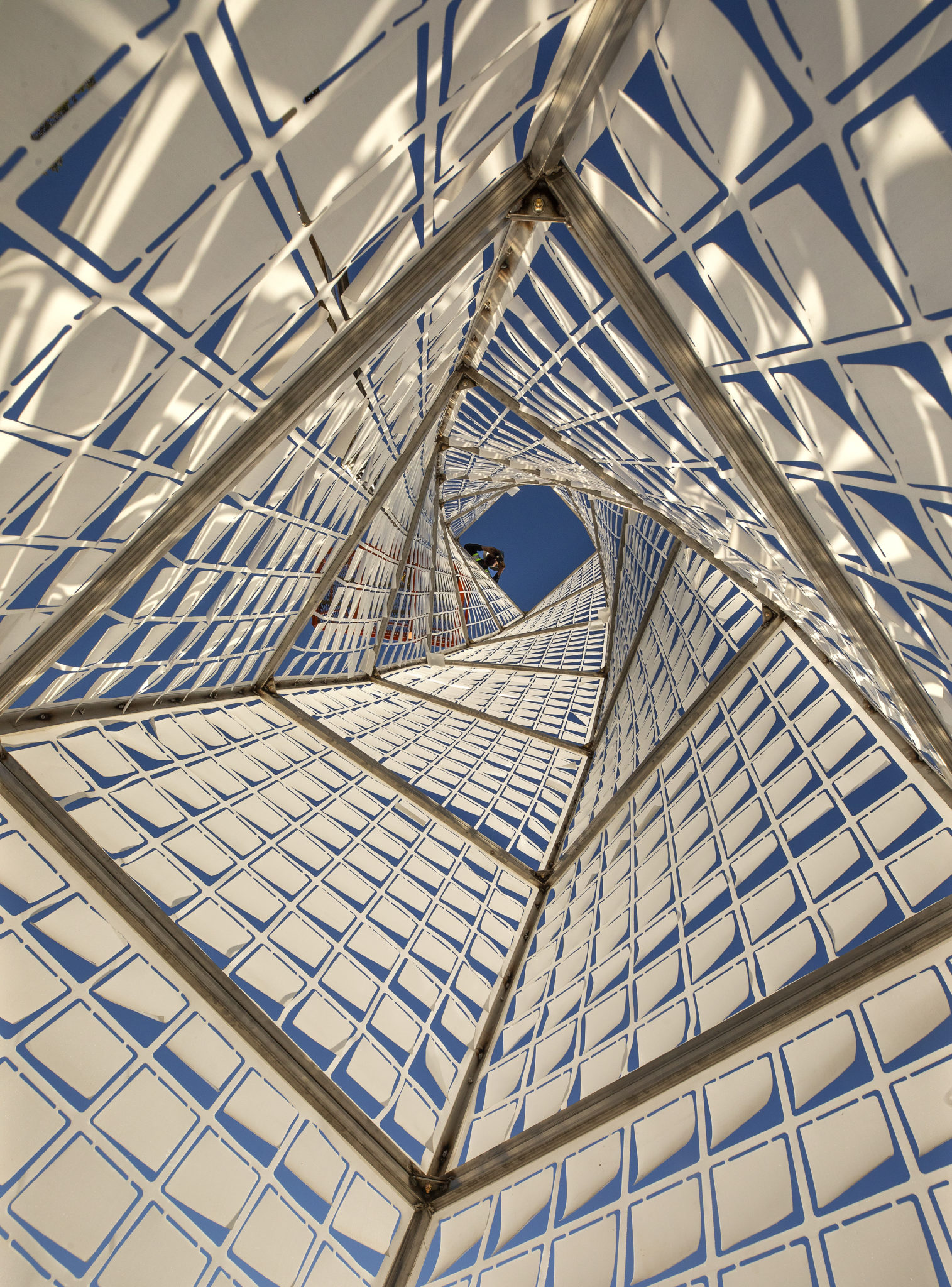 Looking upward through a 30-foot "Twisted Tower" covered in laser cut teflon squares designed to move in the wind in a temporary "Air Garden" created by artist Ned Kahn on the site of the future Hotel Sebastopol on Friday, December 11, 2020. (Photo by John Burgess/The Press Democrat)