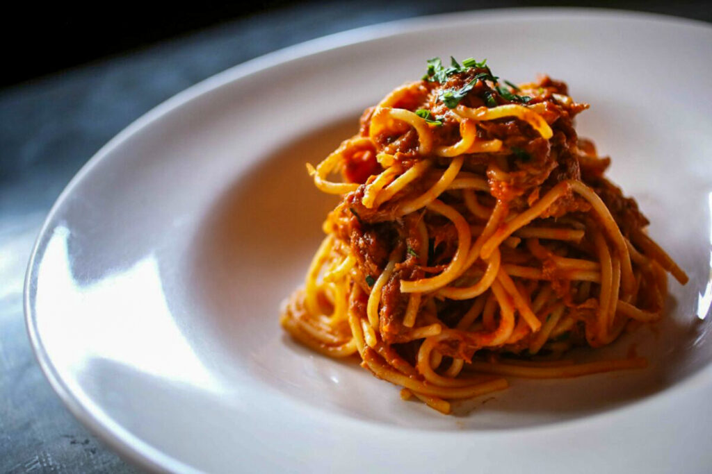 Spaghetti alla Bolognese is served at Baci Cafe & Wine Bar in Healdsburg on Wednesday, November 27, 2013. (Conner Jay/The Press Democrat)
