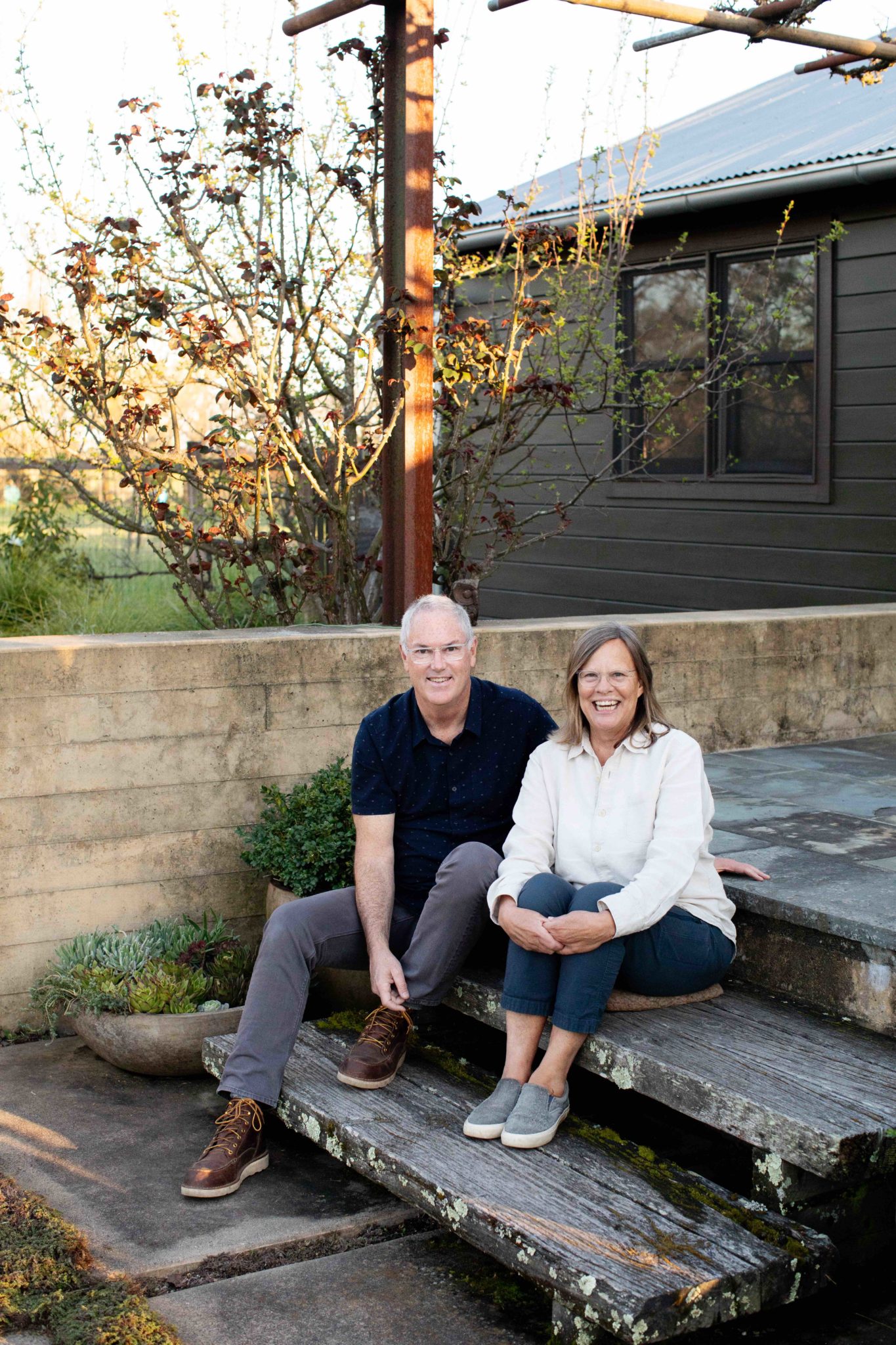 Dave and Nancy Roche on the steps of their back terrace. (Eileen Roche)