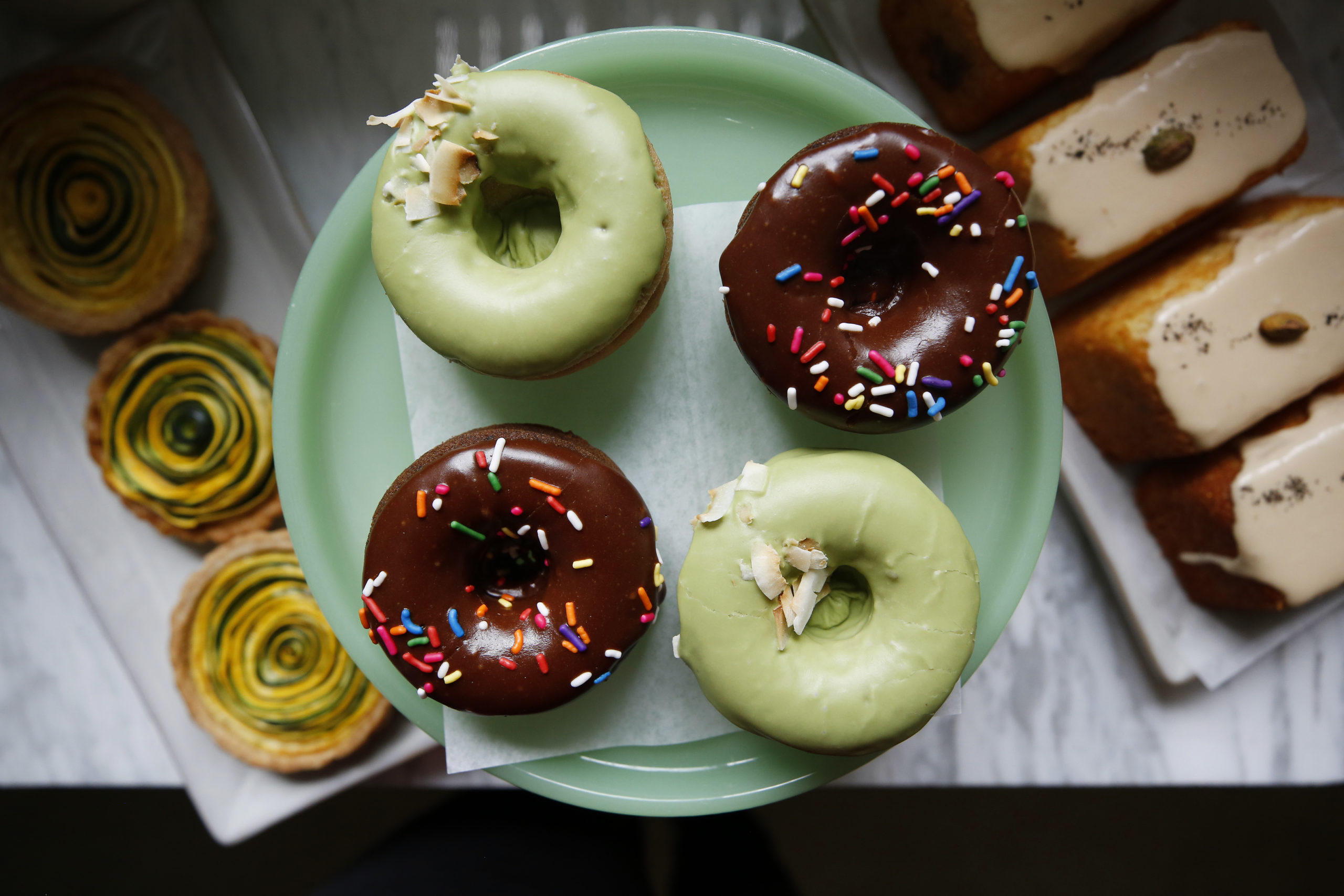 Mochi donuts, gluten-free summer squash tartlets, left, and Earl Grey polenta olive oil cakes, right, at The Altamont General Store in Occidental. (Beth Schlanker/Sonoma Magazine)