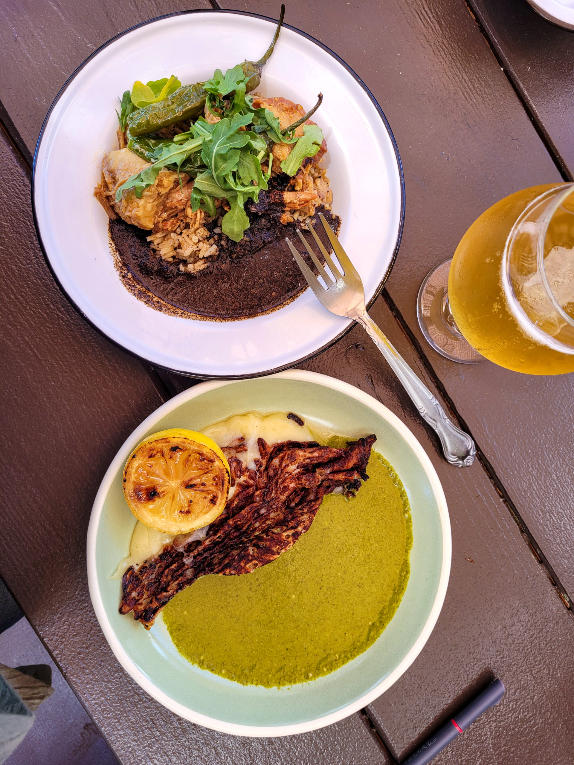 Dirty rice with Carnitas and grilled cheese in a verde sauce at Old Possum Brewing/Barrio in Santa Rosa. (Heather Irwin / Sonoma Magazine)