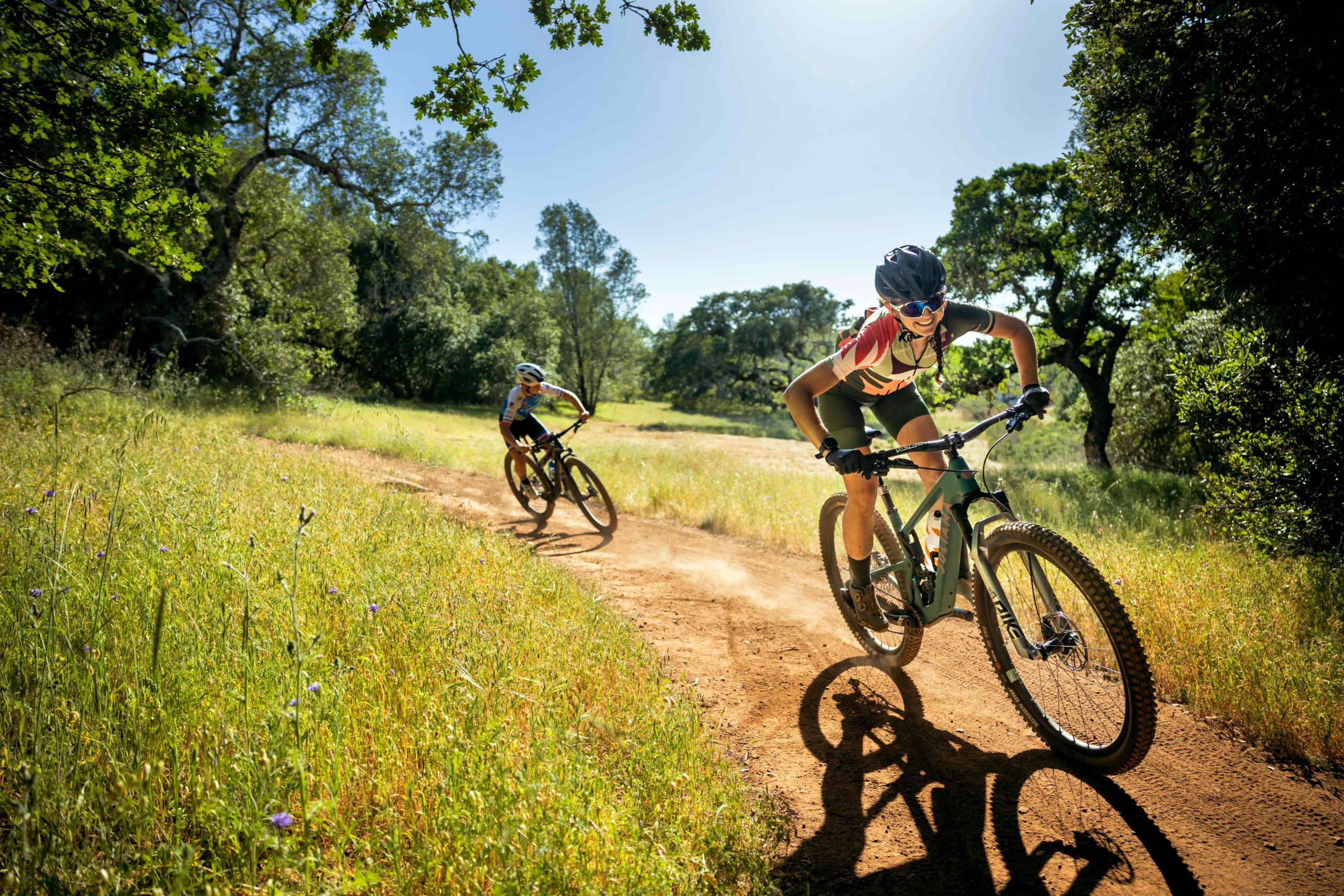 Pro mountain biker Larissa Connors, right, with her mentee, junior national champion rider Vida Lopez de San Roman, who lives in Sebastopol. The two often train together in Trione-Annadel State Park. (Chris Hardy)