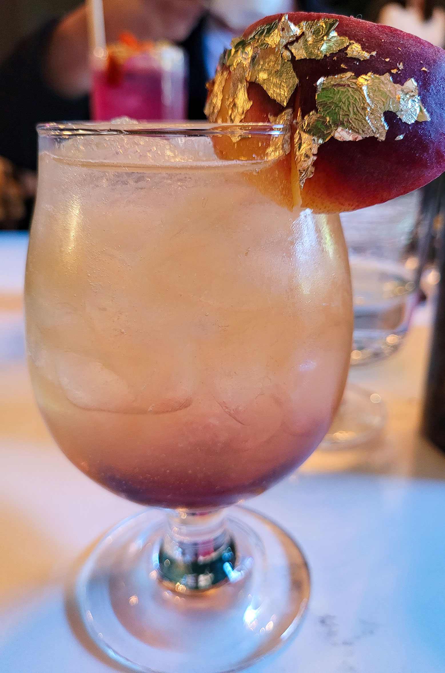 The High Priestess with house smoked Sabe Blanco Tequila, peach and apricot nectar, peach bitters, rose and elderberry at Fourth Street Social Club. Heather Irwin
