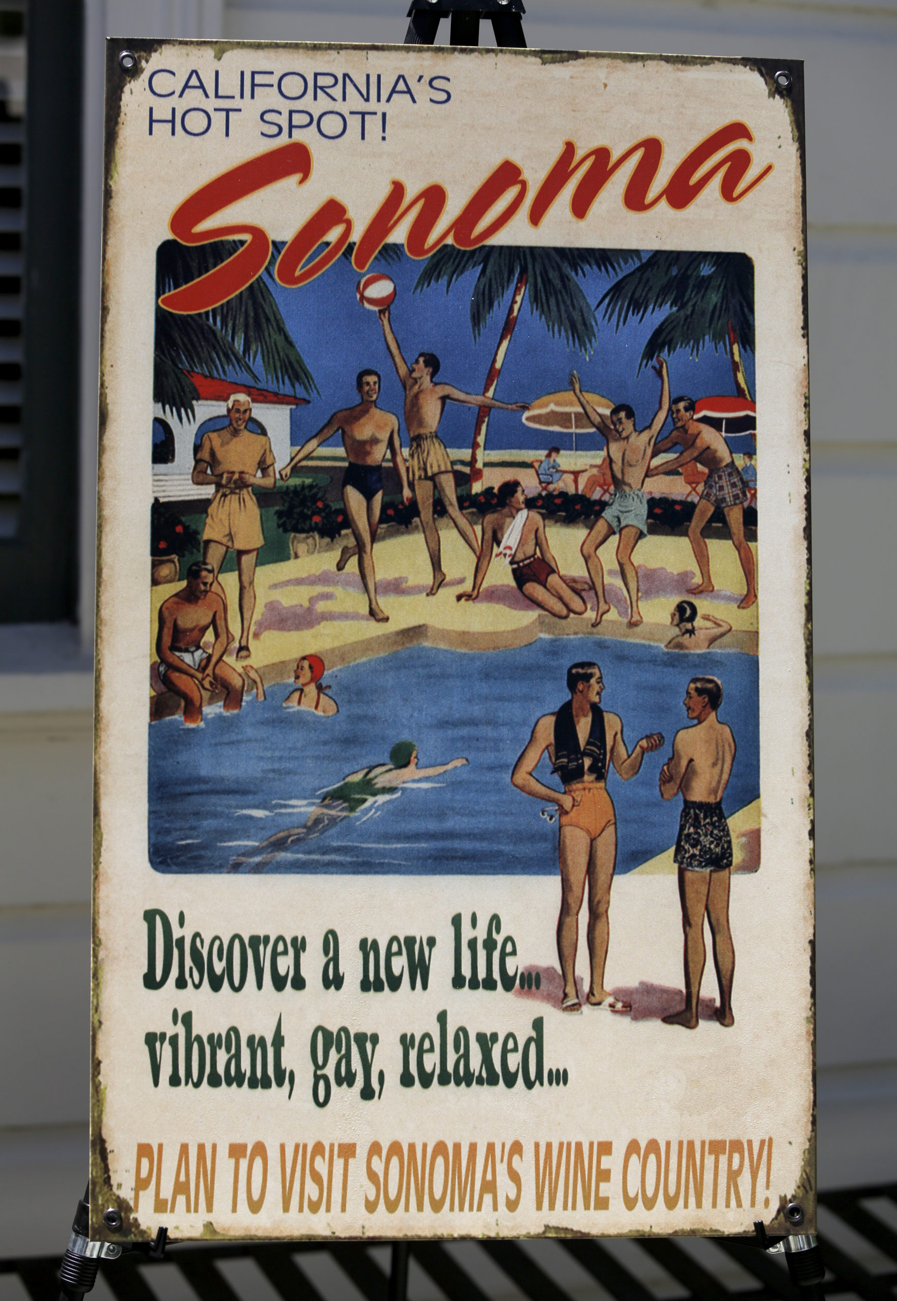 A sign displayed during pool party as part of Gay Wine Weekend at MacArthur Place on Sunday, June 21, 2015 in Sonoma, California . (BETH SCHLANKER/ The Press Democrat)