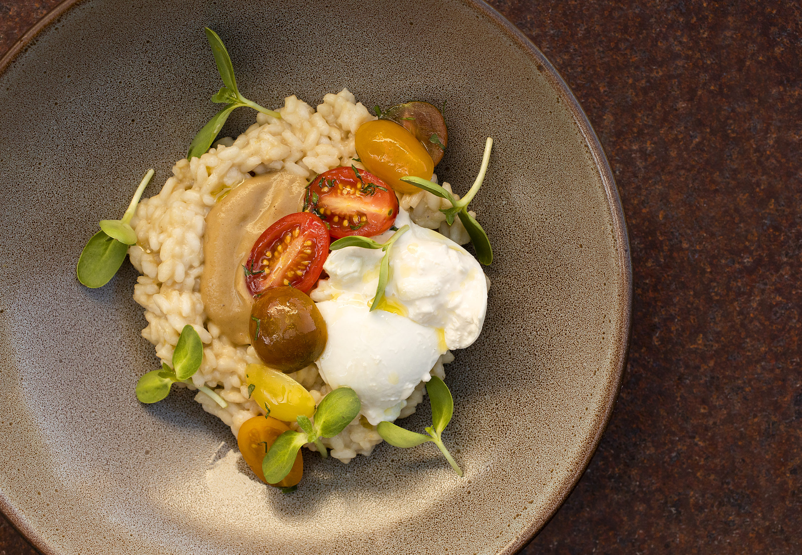 Smoky Eggplant Risotto with Burrata, Cherry Tomatoes and Sunflower Shoots from St. Francis Winery executive chef Peter Janiak on May 19, 2021. (Photo by John Burgess/The Press Democrat)