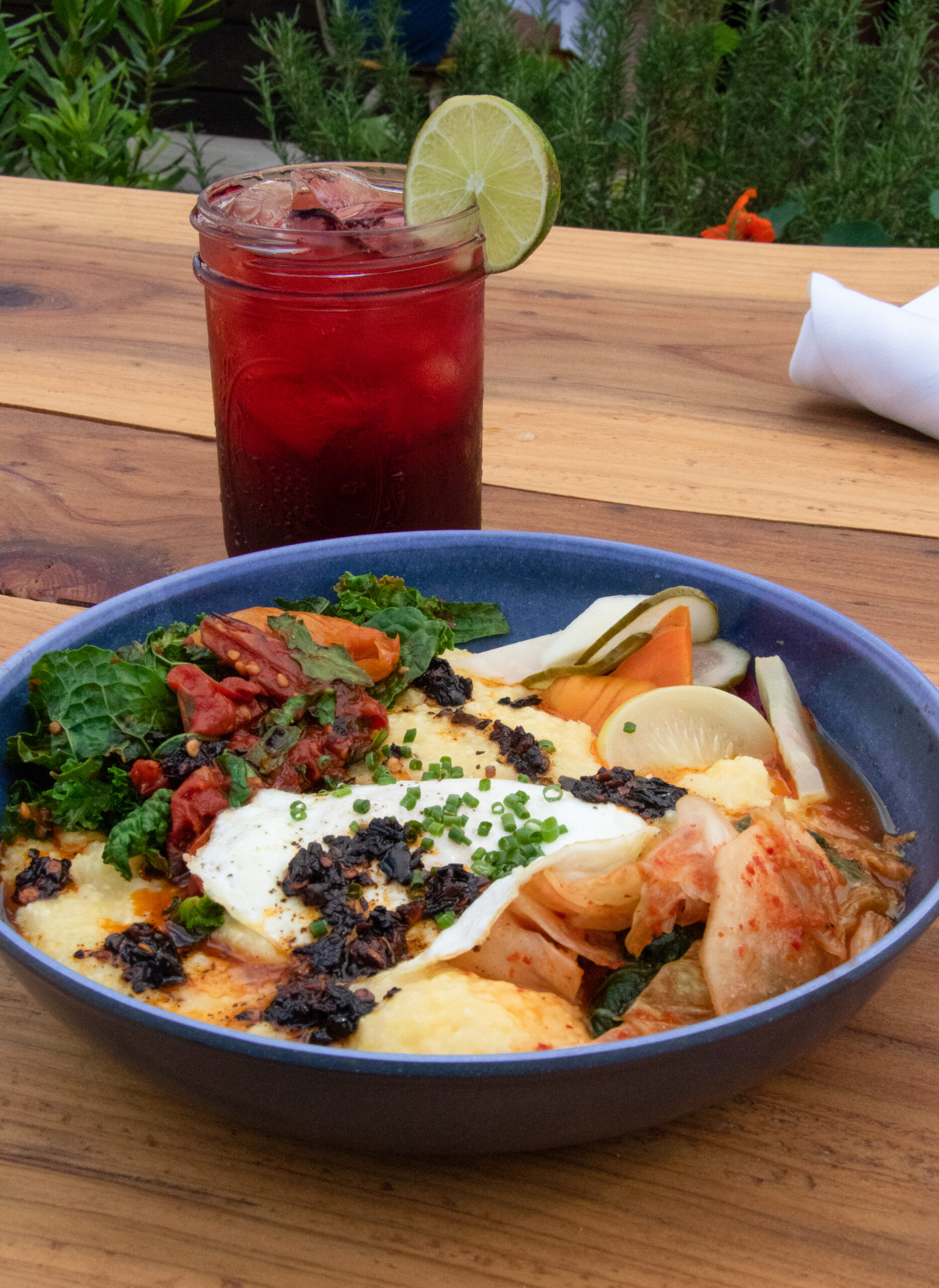 "Hot Mess" breakfast with polenta, fried egg, kale, kimchi and "pickled things" at Wishbone. Heather Irwin/Press Democrat