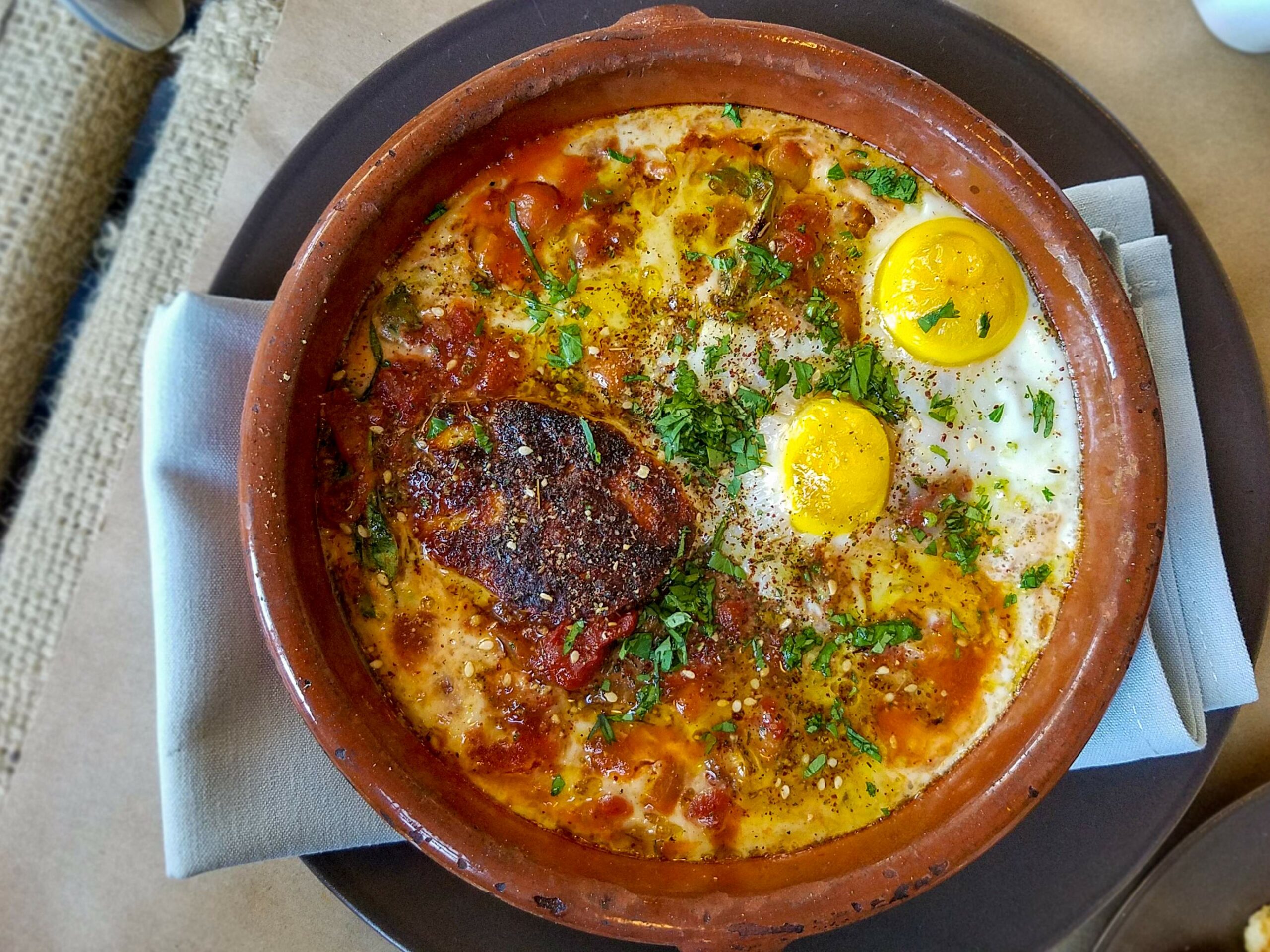 Shakshuka with chickpea, fava and tomato stew at Pearl restaurant in Petaluma. (Heather Irwin / The Press Democrat)