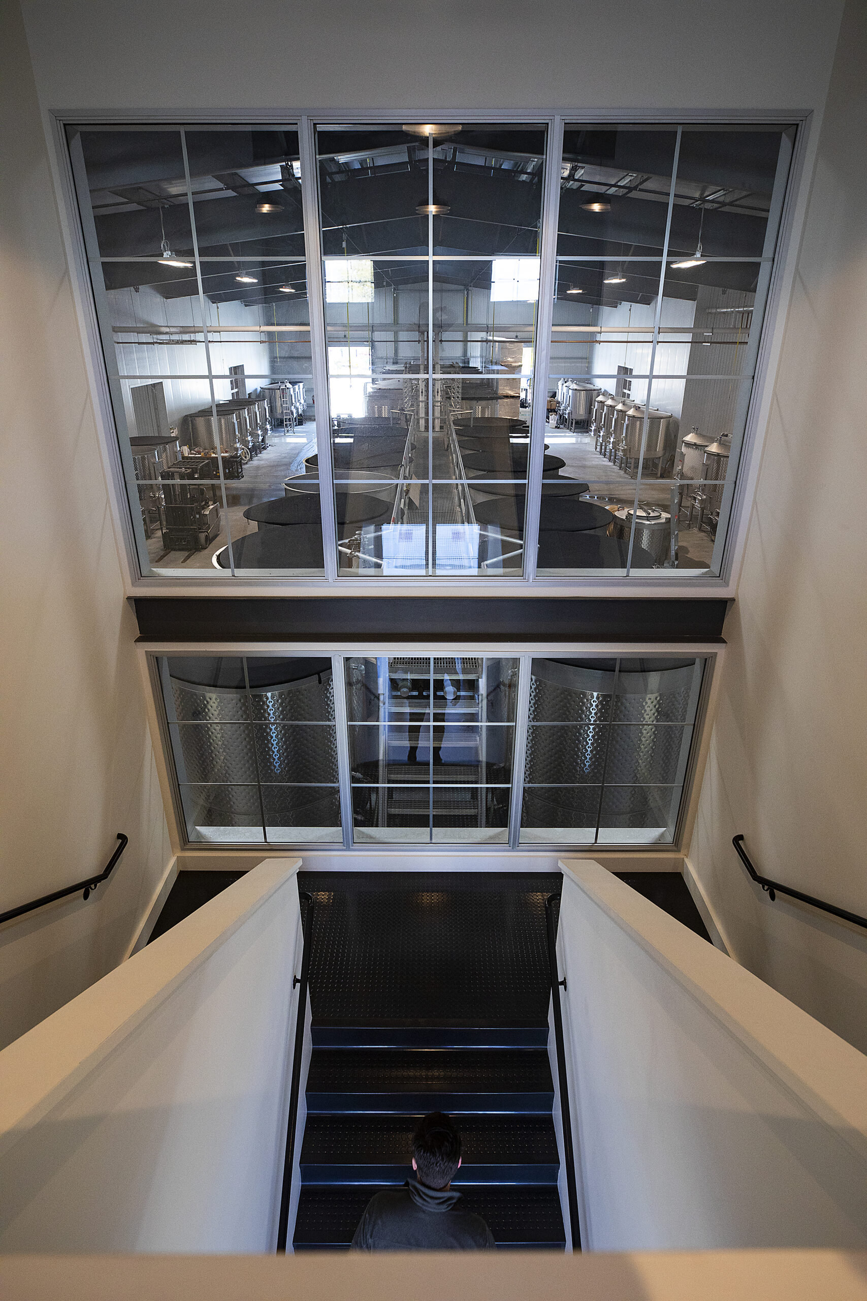 At Grand Cru Custom Crush in Windsor the upper offices have views into the fermentation room. (photo by John Burgess/Sonoma Magazine)