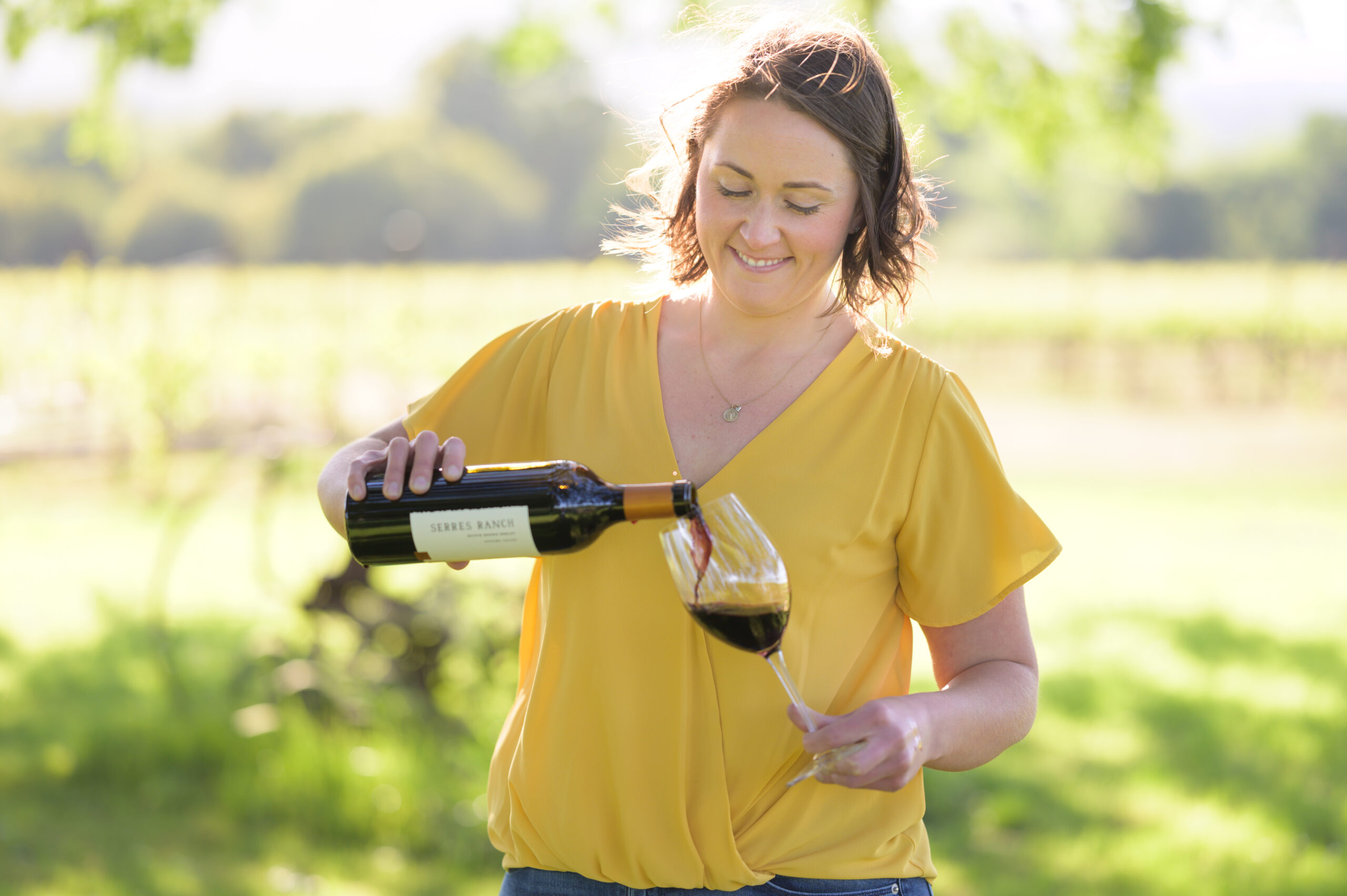 Taylor Serres pours wine at Serres Ranch in Sonoma. (Bob McClenahan/Serres Ranch)