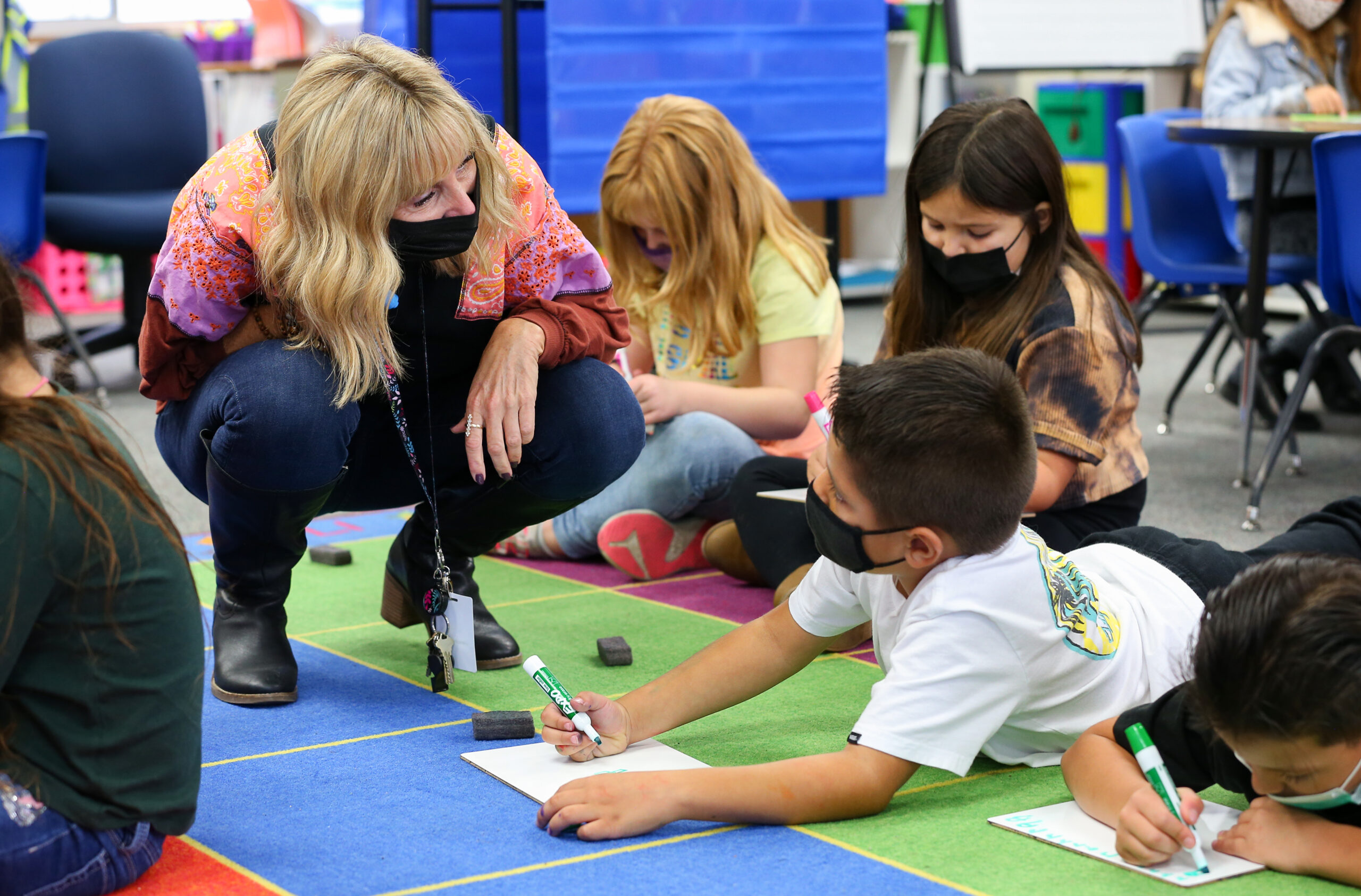 Teacher Jen Grady works with Andrew Ceja in her reading intervention class at Mattie Washburn Elementary School in Windsor on Tuesday, November 2, 2021. (Christopher Chung/ The Press Democrat)