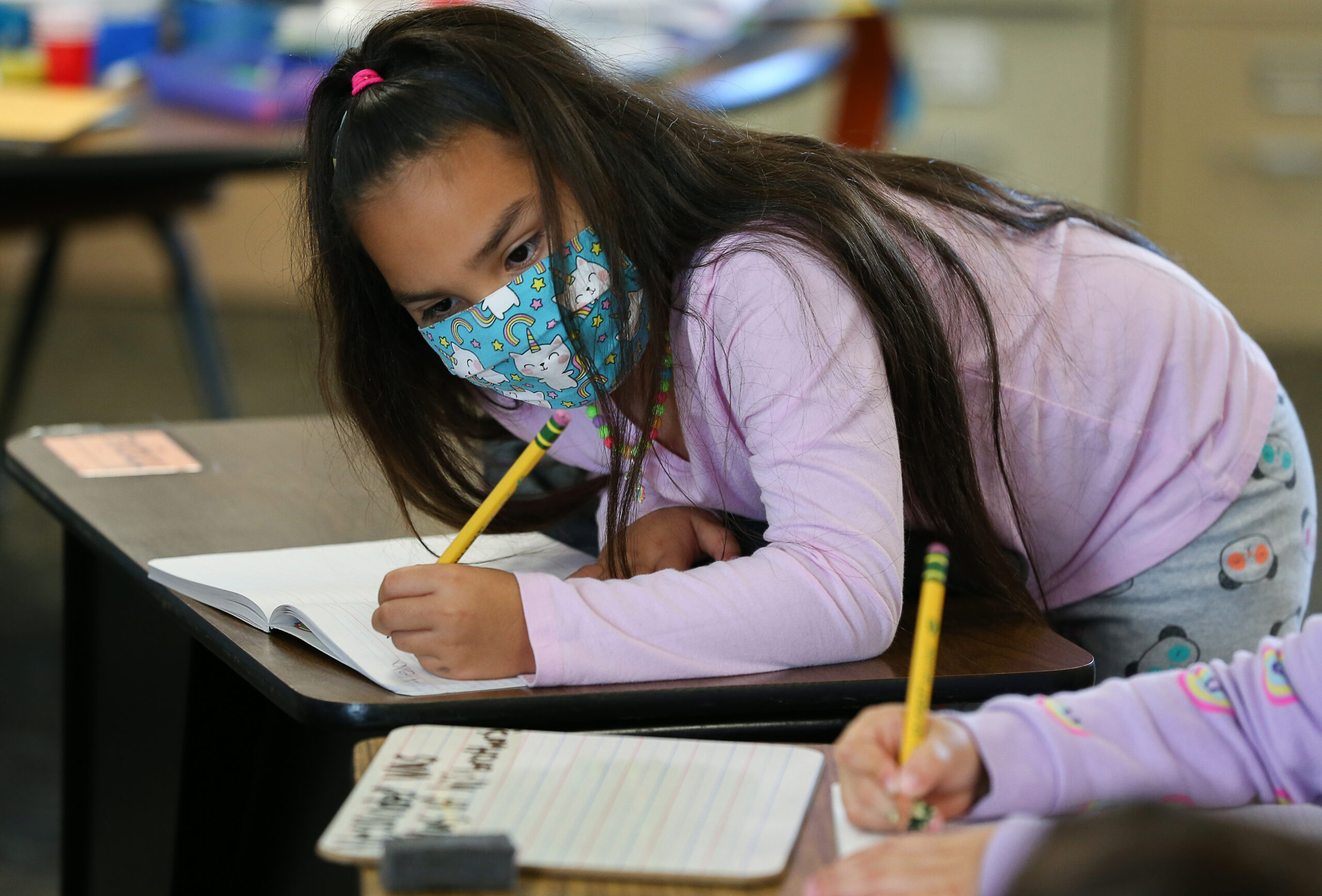 Second-grader Jimena Mondoza-Rios practices writing during her English language development class at Mattie Washburn Elementary School in Windsor on Tuesday, November 2, 2021. (Christopher Chung/ The Press Democrat)