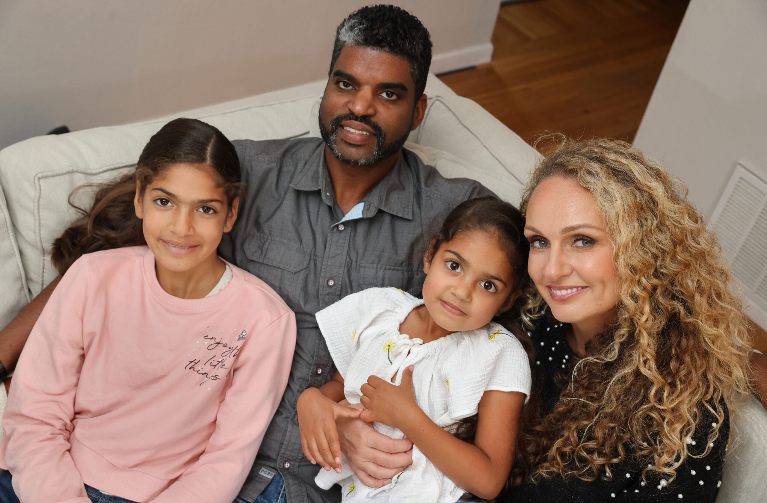 Xavier and Karolina Nazario with their daughters Zosia, 9, and Hania, 5. (Christopher Chung/ The Press Democrat)