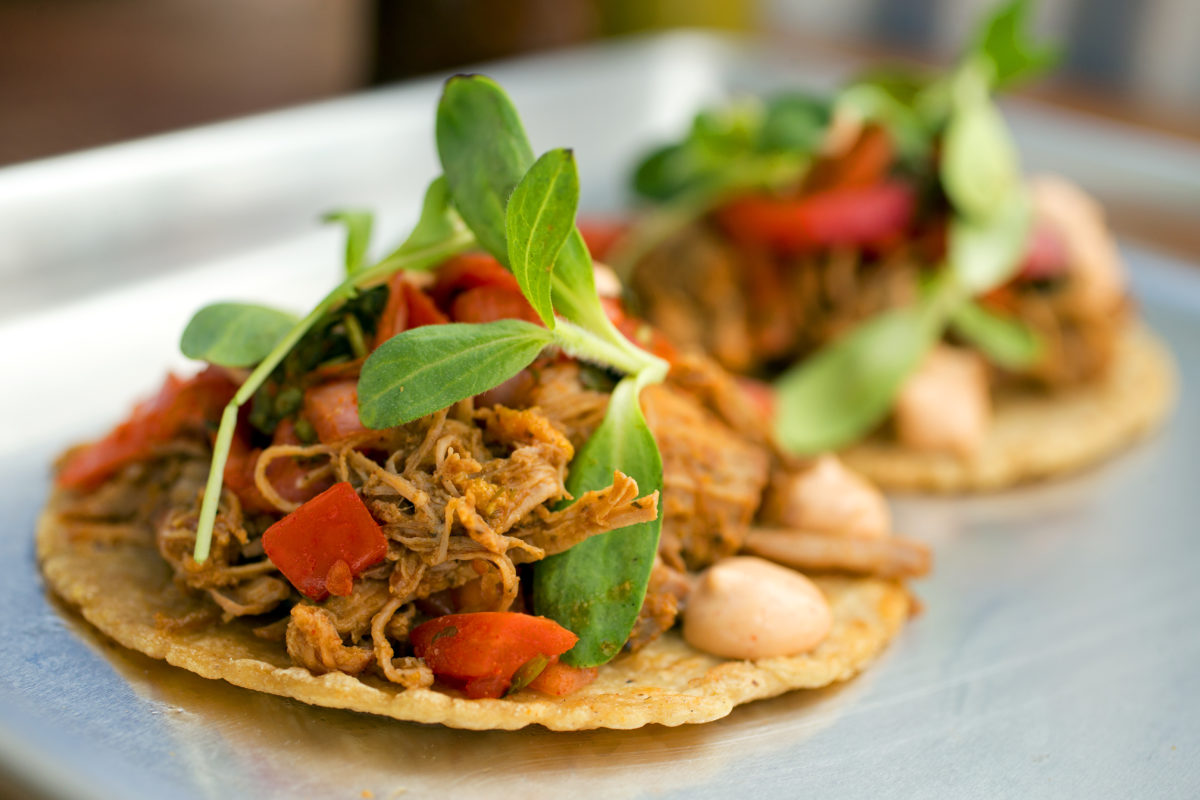 Dos Tacos with two yellow tortillas, your choice of meat, topped with chipotle aioli, pico de gallo, arugula and micro greens from Barrio Fresca Cocina Mexicana in Sebastopol's The Barlow. (John Burgess/The Press Democrat)