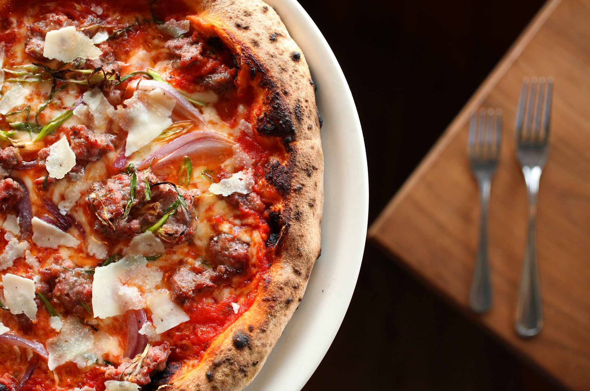 The Salsiccia Pizza, containing house sausage, red onions, and pecorino, at Diavola Pizzeria & Salumeria, in Geyserville. (Christopher Chung/The Press Democrat)